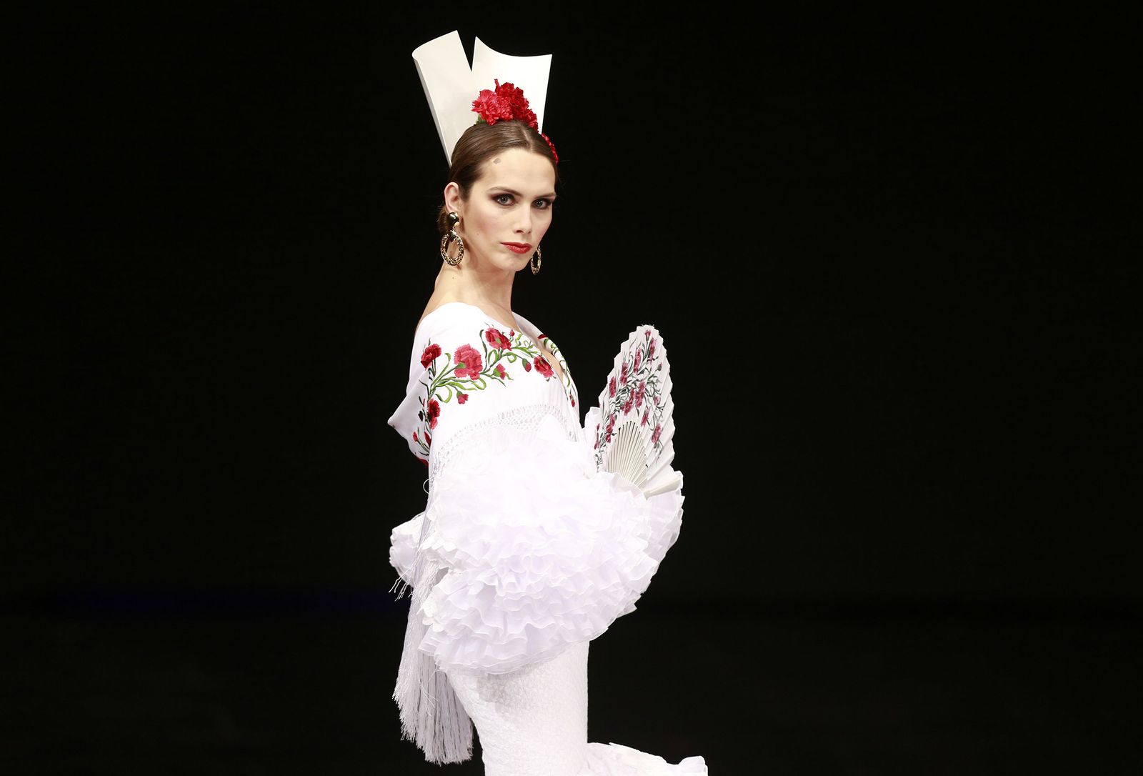 Desfile de Luis Fernández.