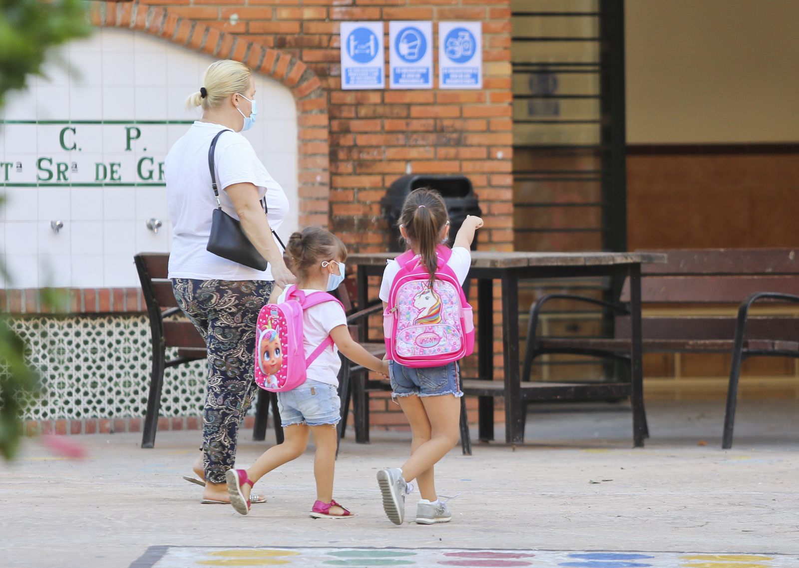 Vuelta al cole en Málaga: Fotos de un día de nervios y mascarillas