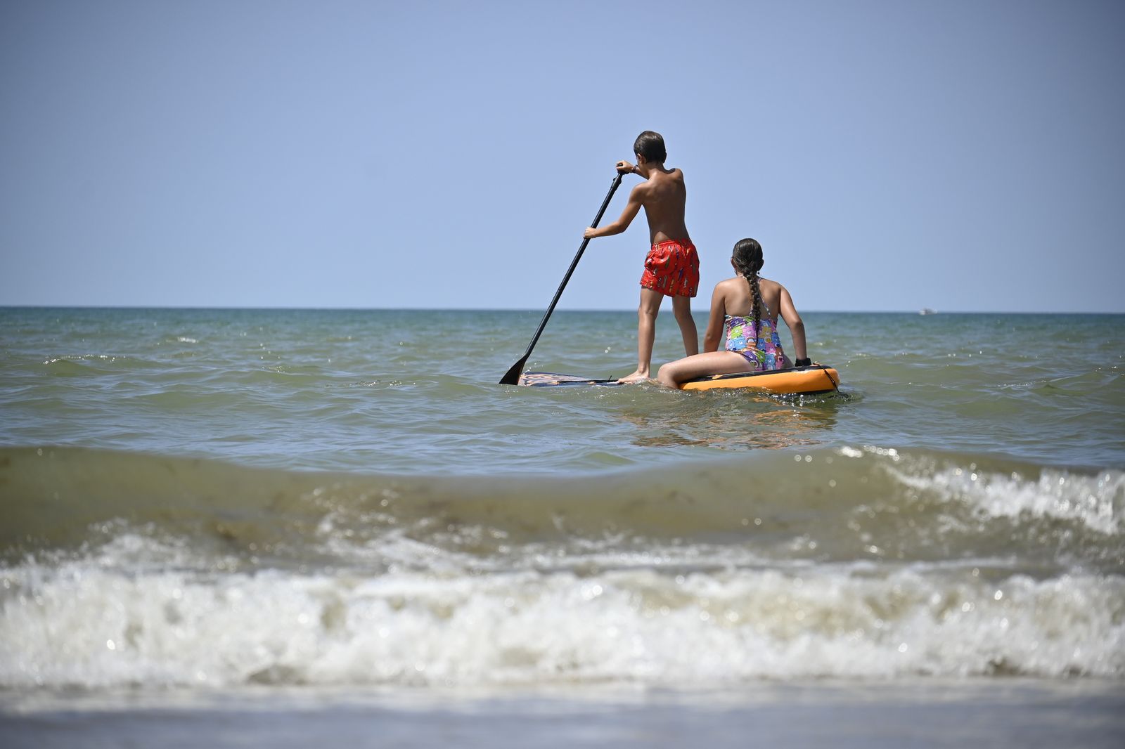 Ambiente en la playas de Huelva este sábado 22 de julio, en imágenes