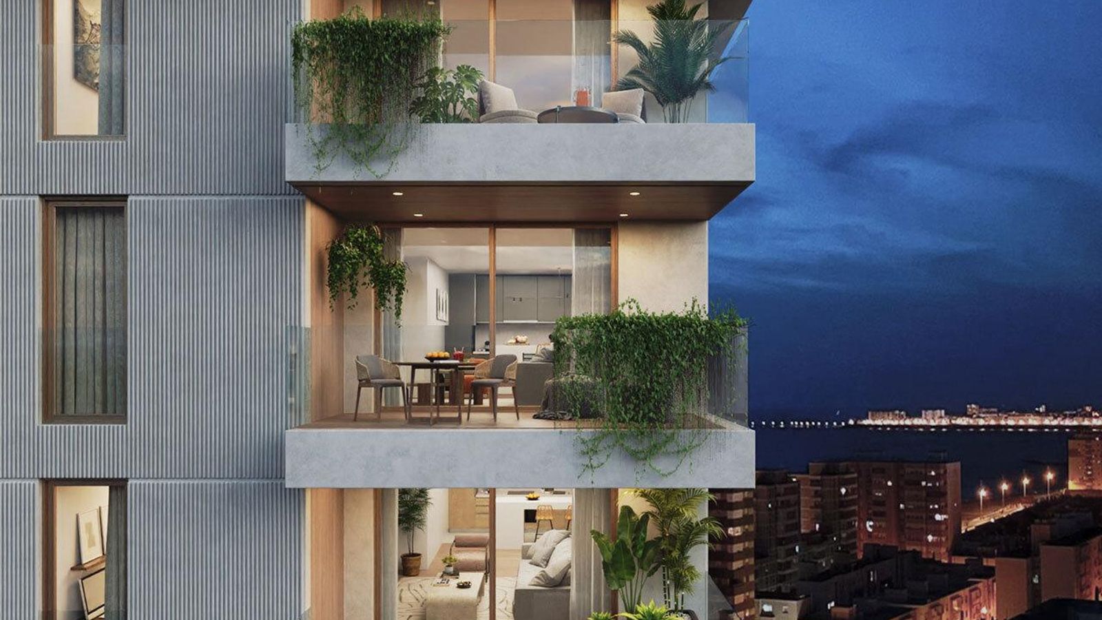 Una recreación nocturna de la torre. Al fondo, el casco antiguo de Cádiz.