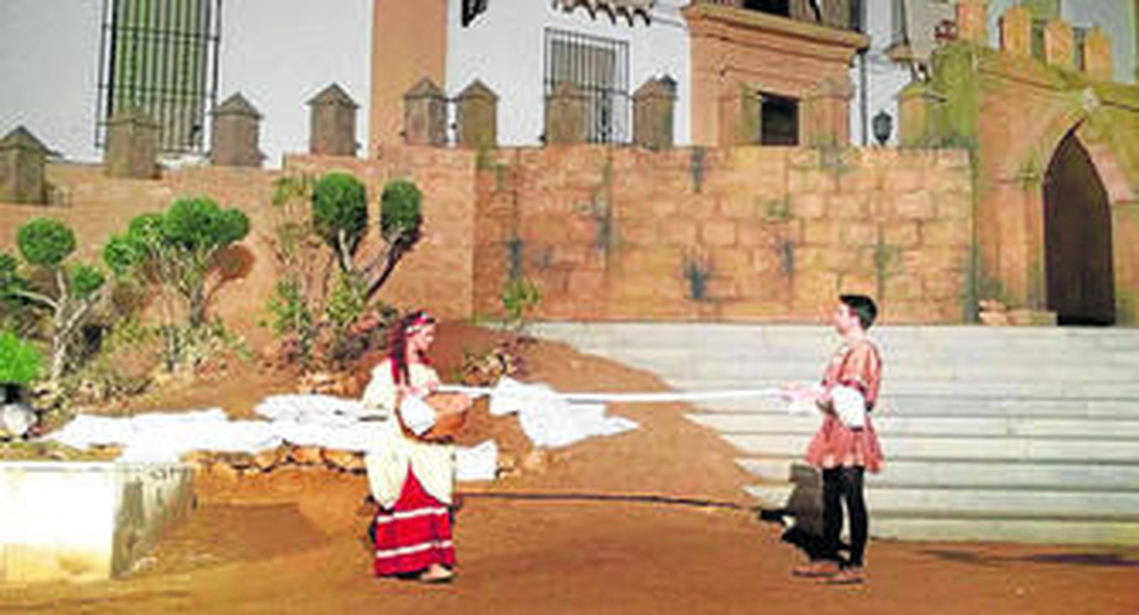 Los protagonistas, en una de las escenas más luminosas del montaje.