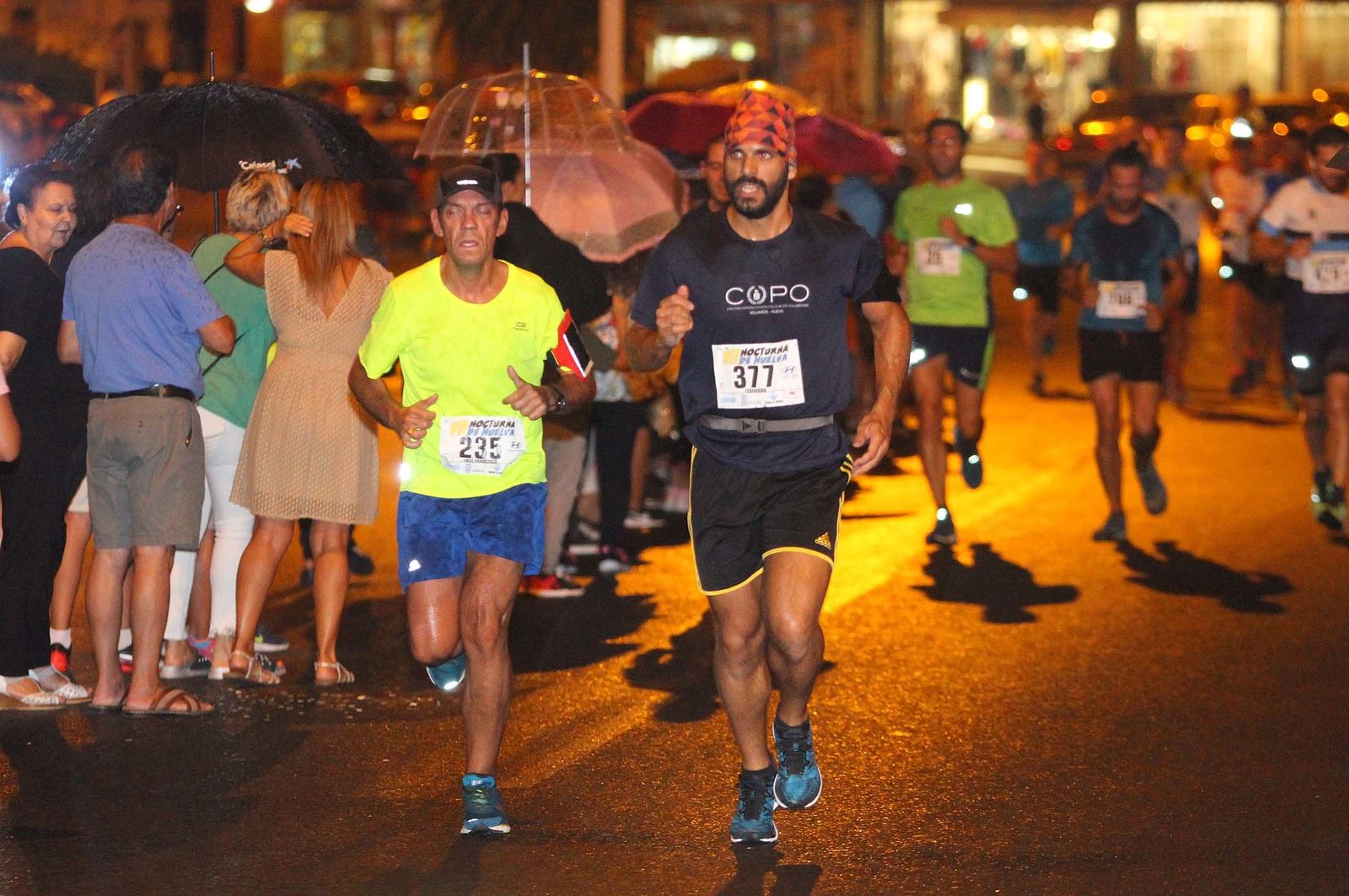 La VII Carrera Nocturna de Huelva en imágenes