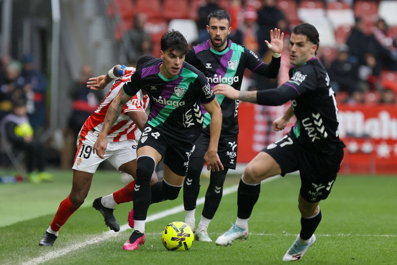 El Sporting-Málaga CF, en fotos