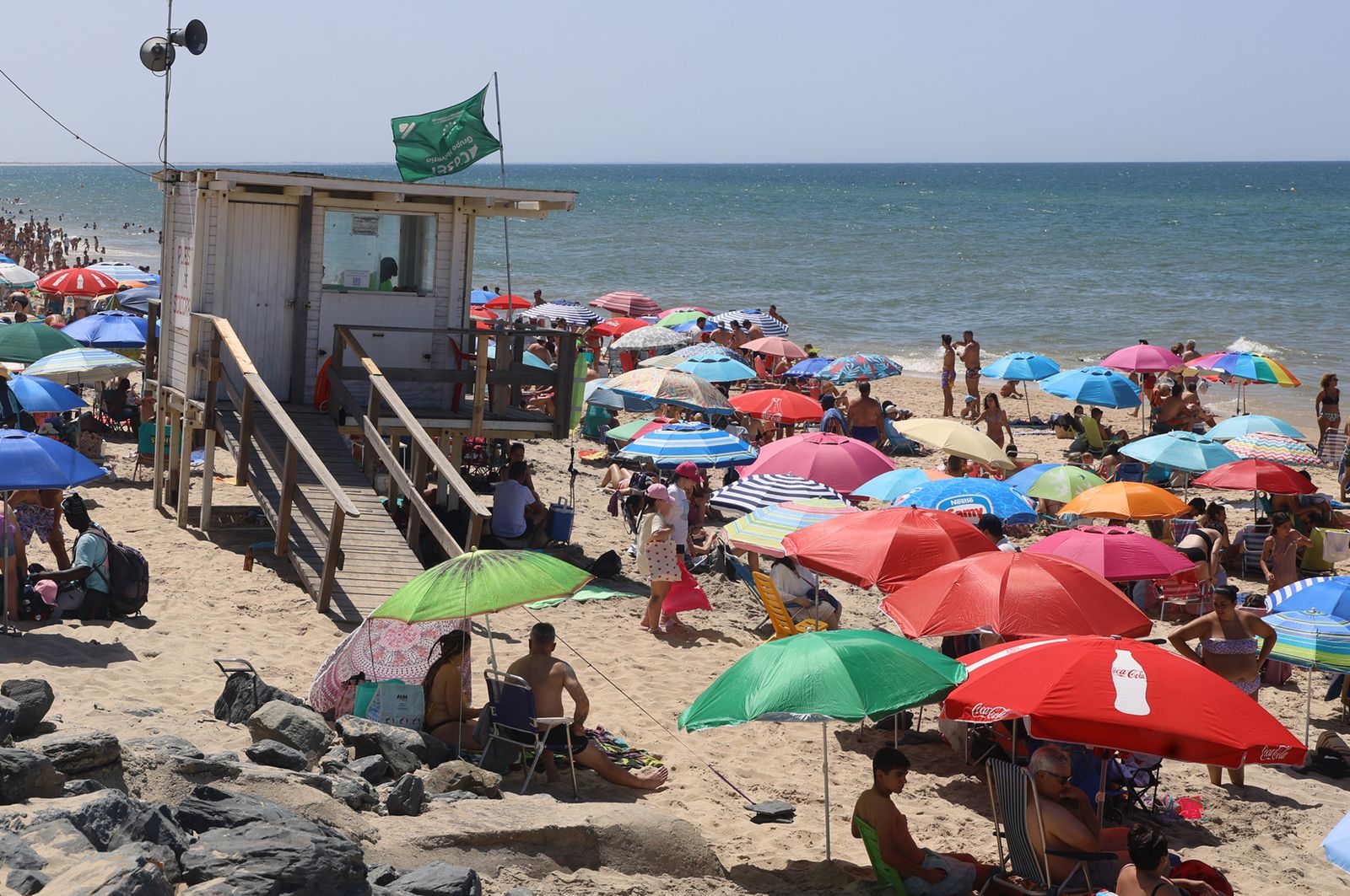 Imágenes de una mañana de calor y playa en Matalascañas