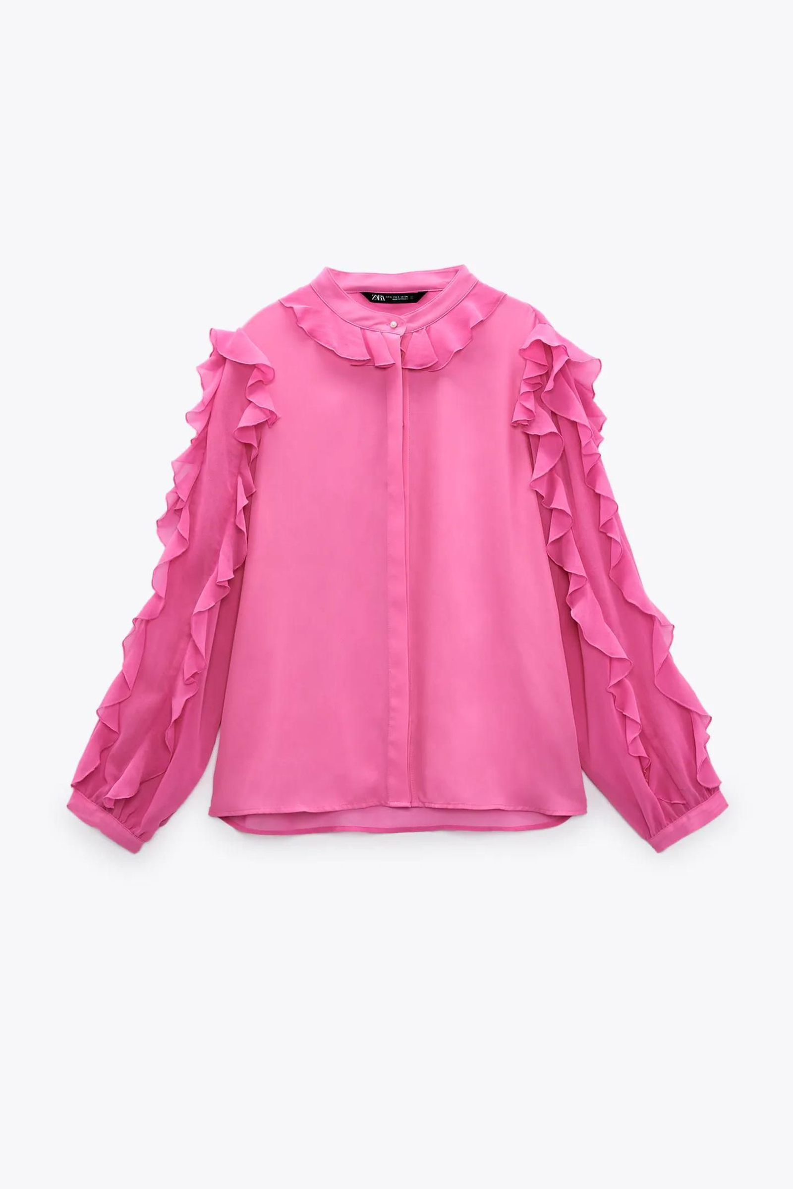 Blusa de Zara rosa fucsia con volantes.