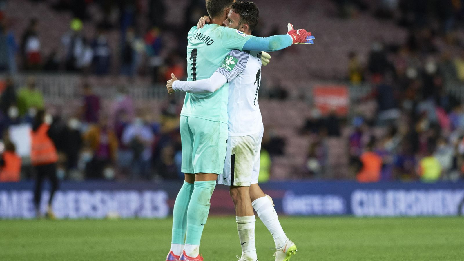 Maximiano festeja con Quini.