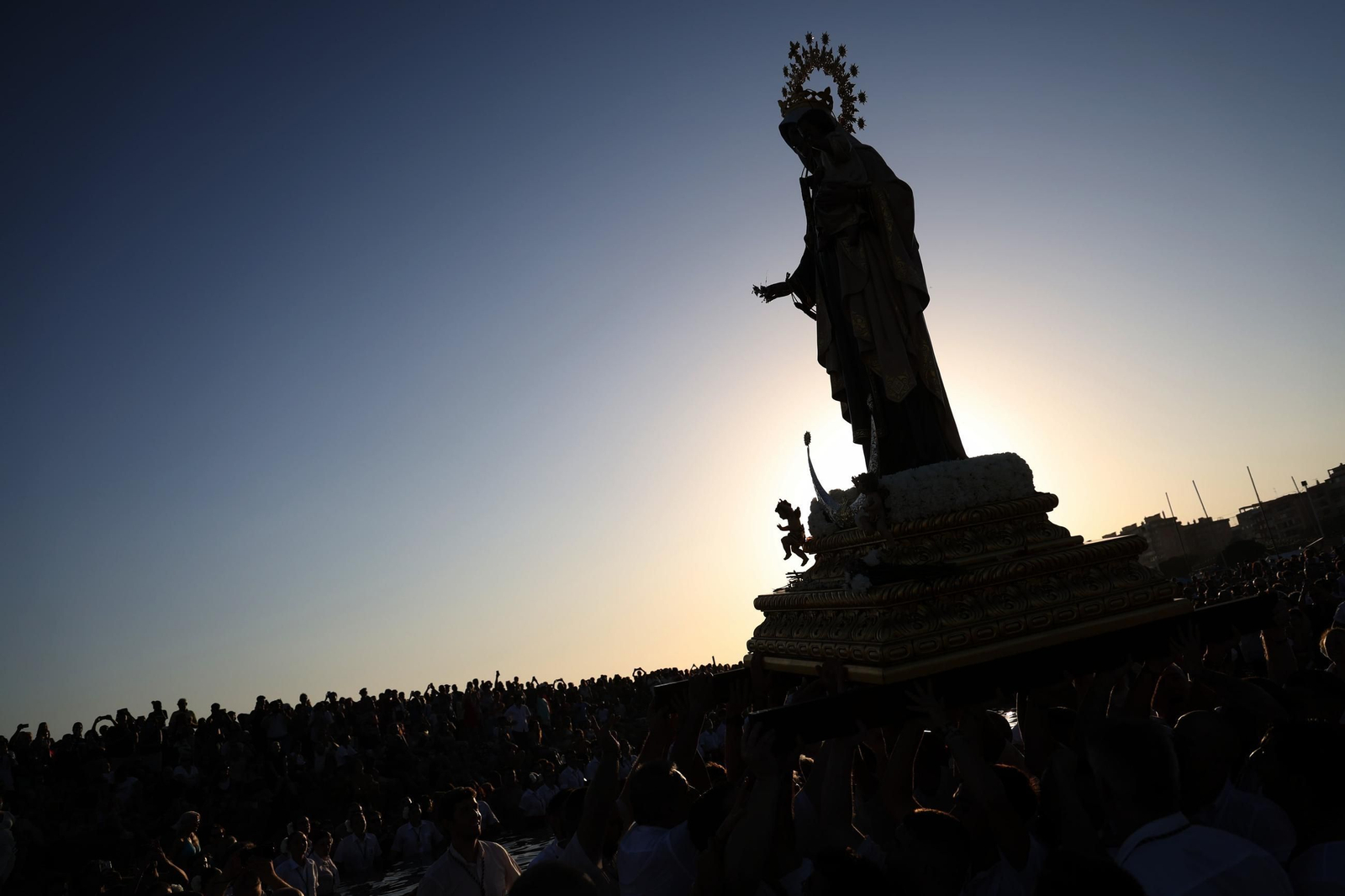 La procesión de la Virgen del Carmen en El Palo, en Málaga, en imágenes
