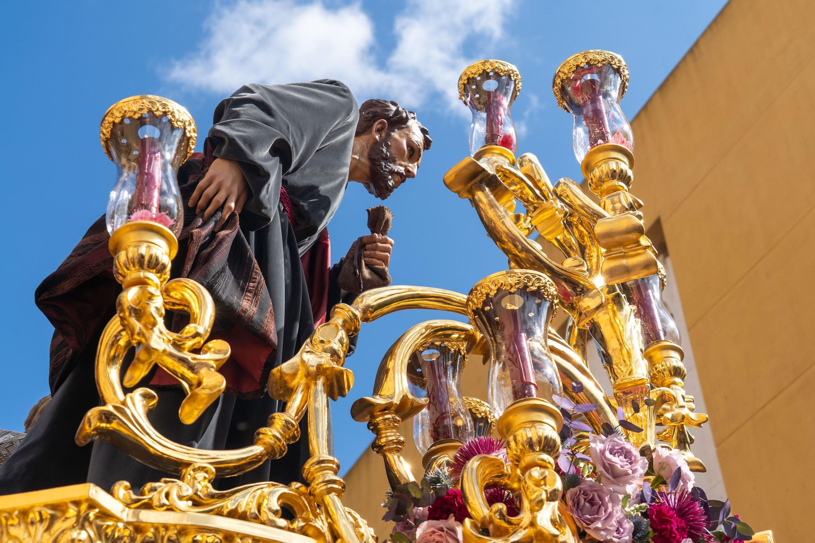 Domingo de Ramos: Imágenes de la procesión de La Sagrada Cena y Maria Santísima del Rosario