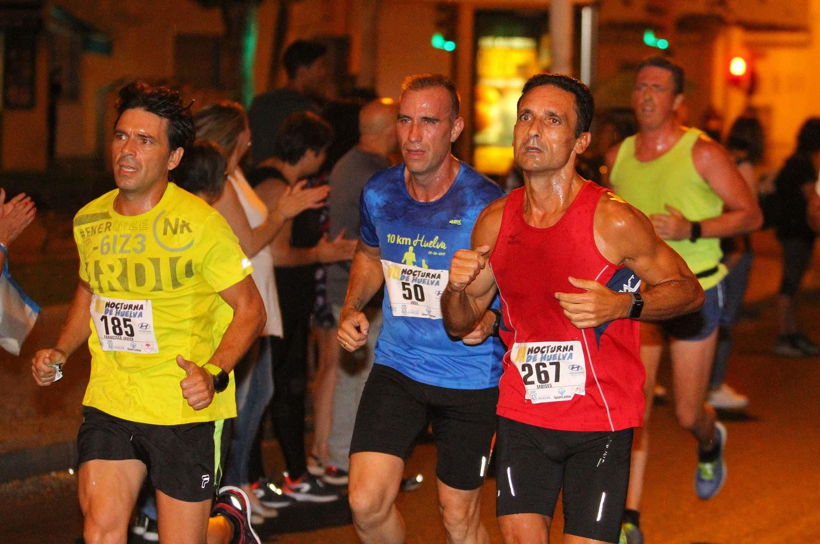 La VII Carrera Nocturna de Huelva en imágenes