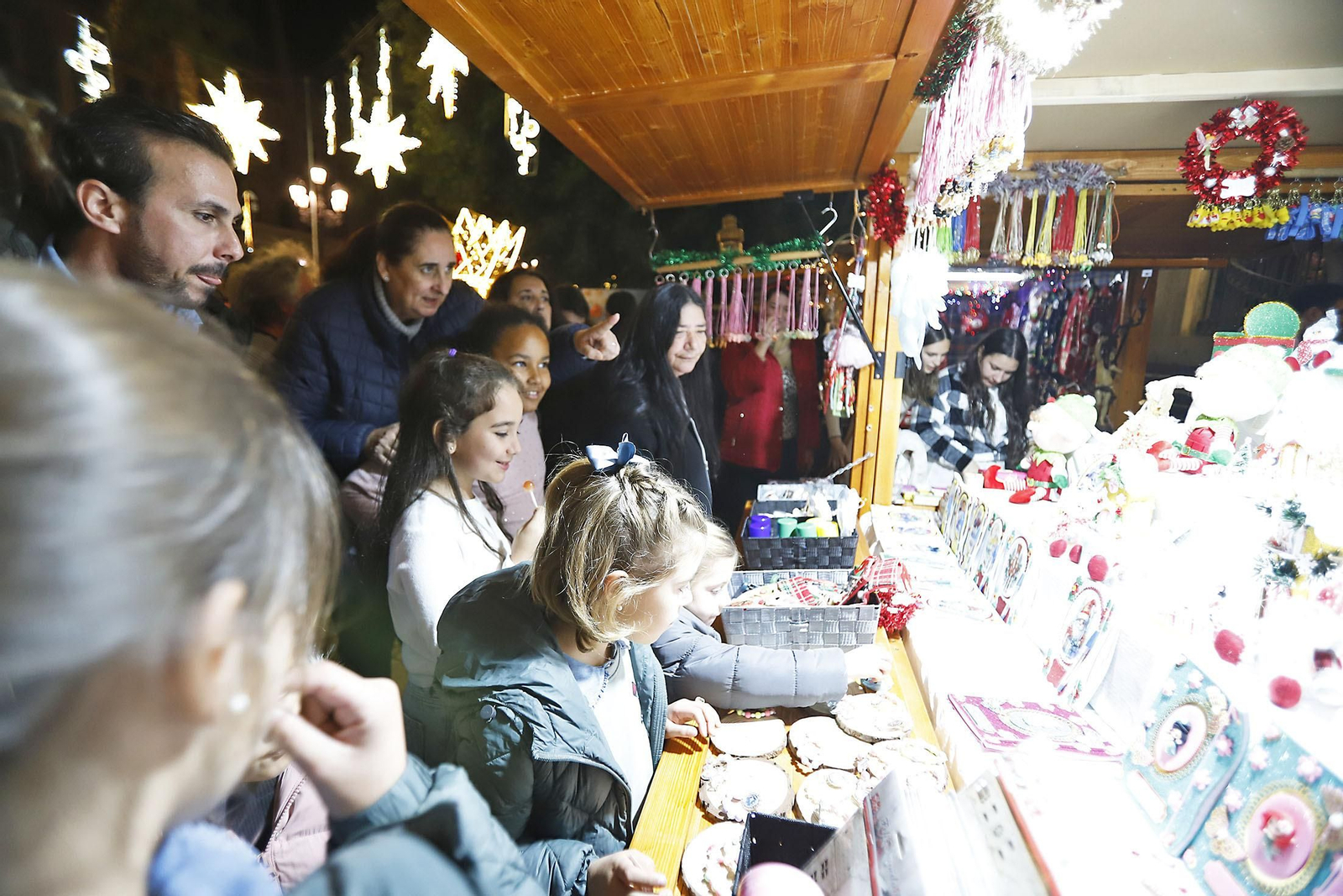 Imágenes del mercado navideño de la Plaza de las Monjas