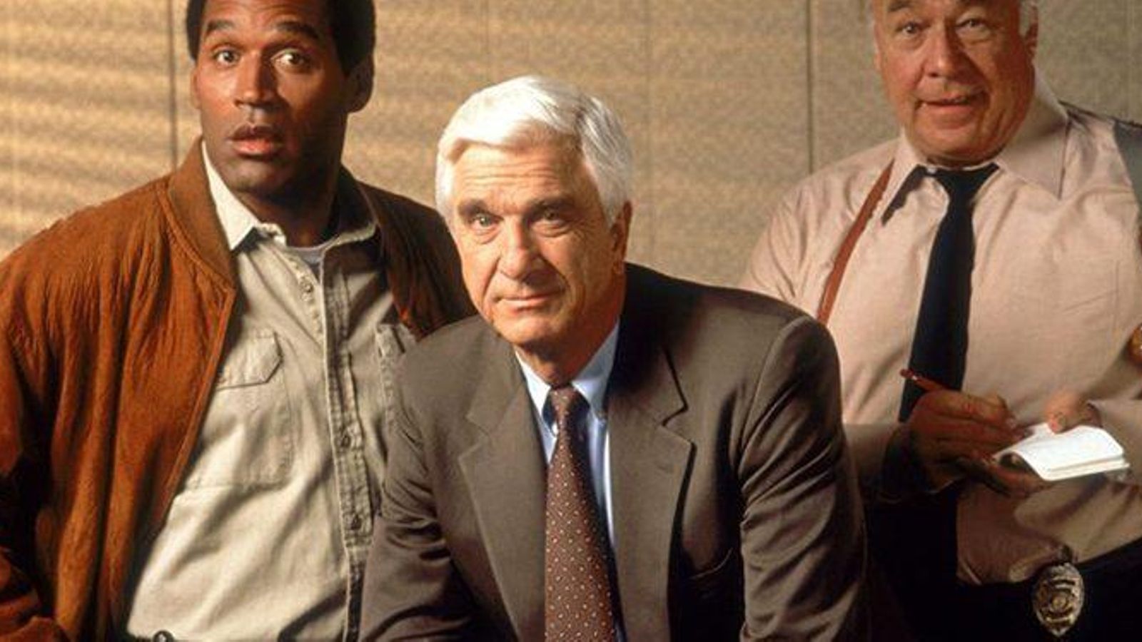 O. J. Simpson, con Leslie Nielsen y George Kennedy en 'Agárralo como puedas'.