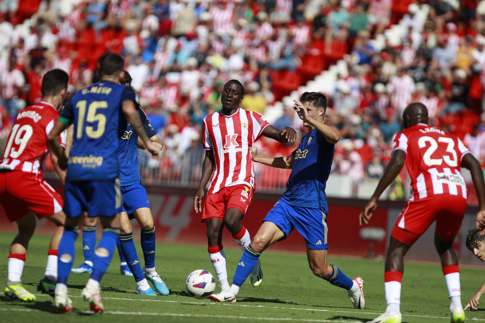 Imágenes del empate a 3 de la U.D. Almería y el Granada C.F.