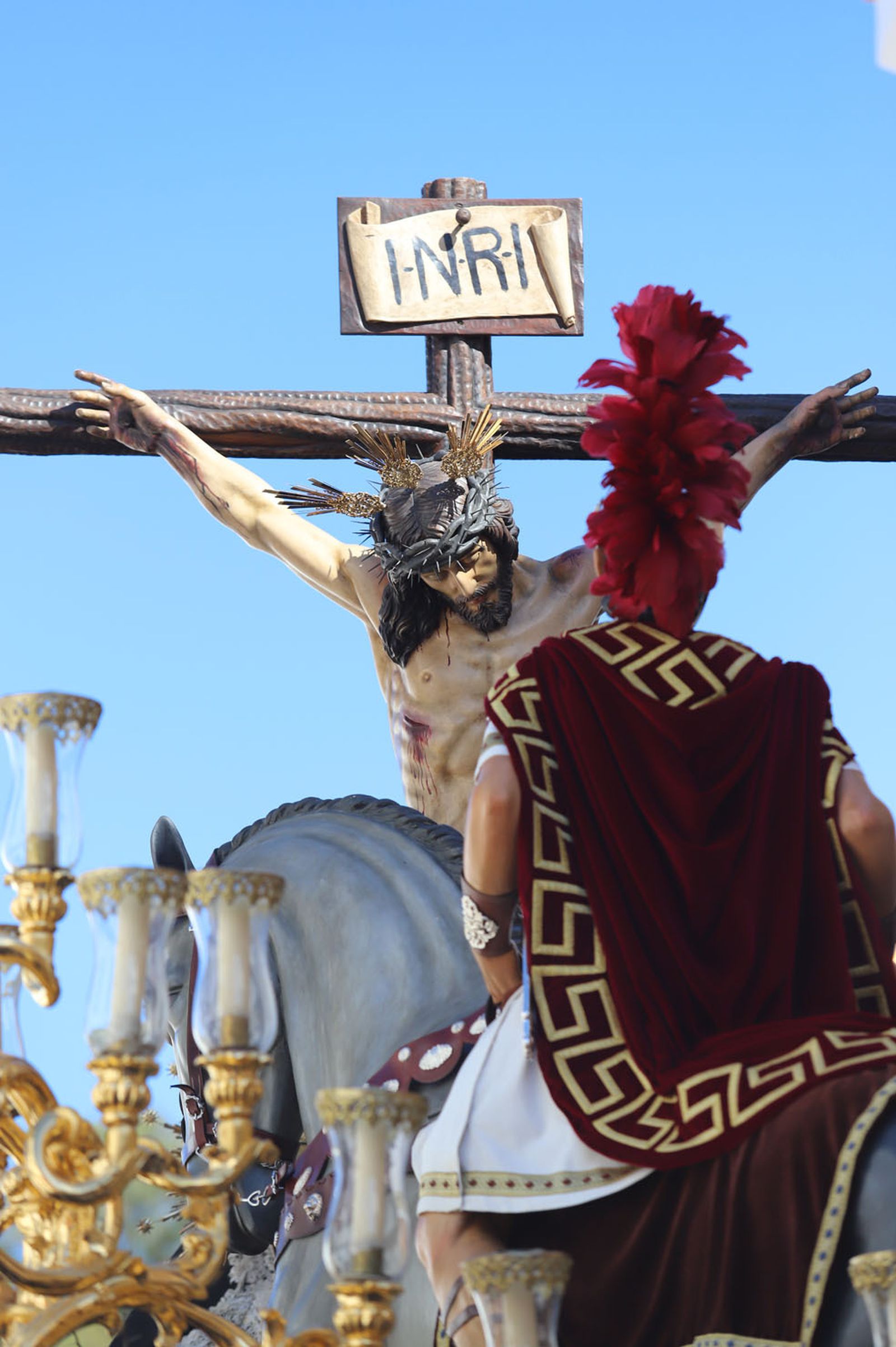 Imágenes de la procesión de la hermandad de la Lanzada de Huelva