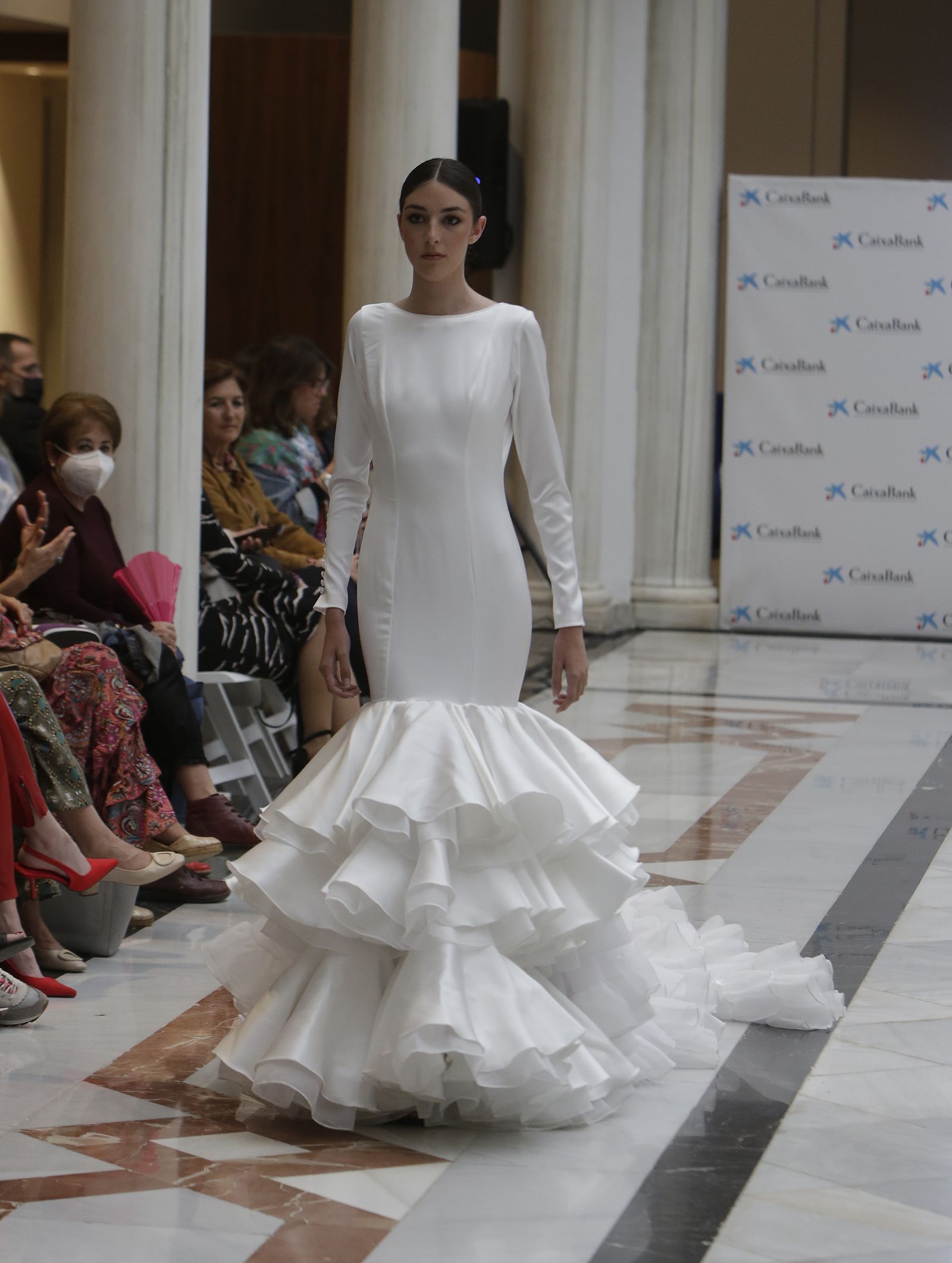 Desfile moda flamenca en las vísperas de la Feria de Abril CaixaBank