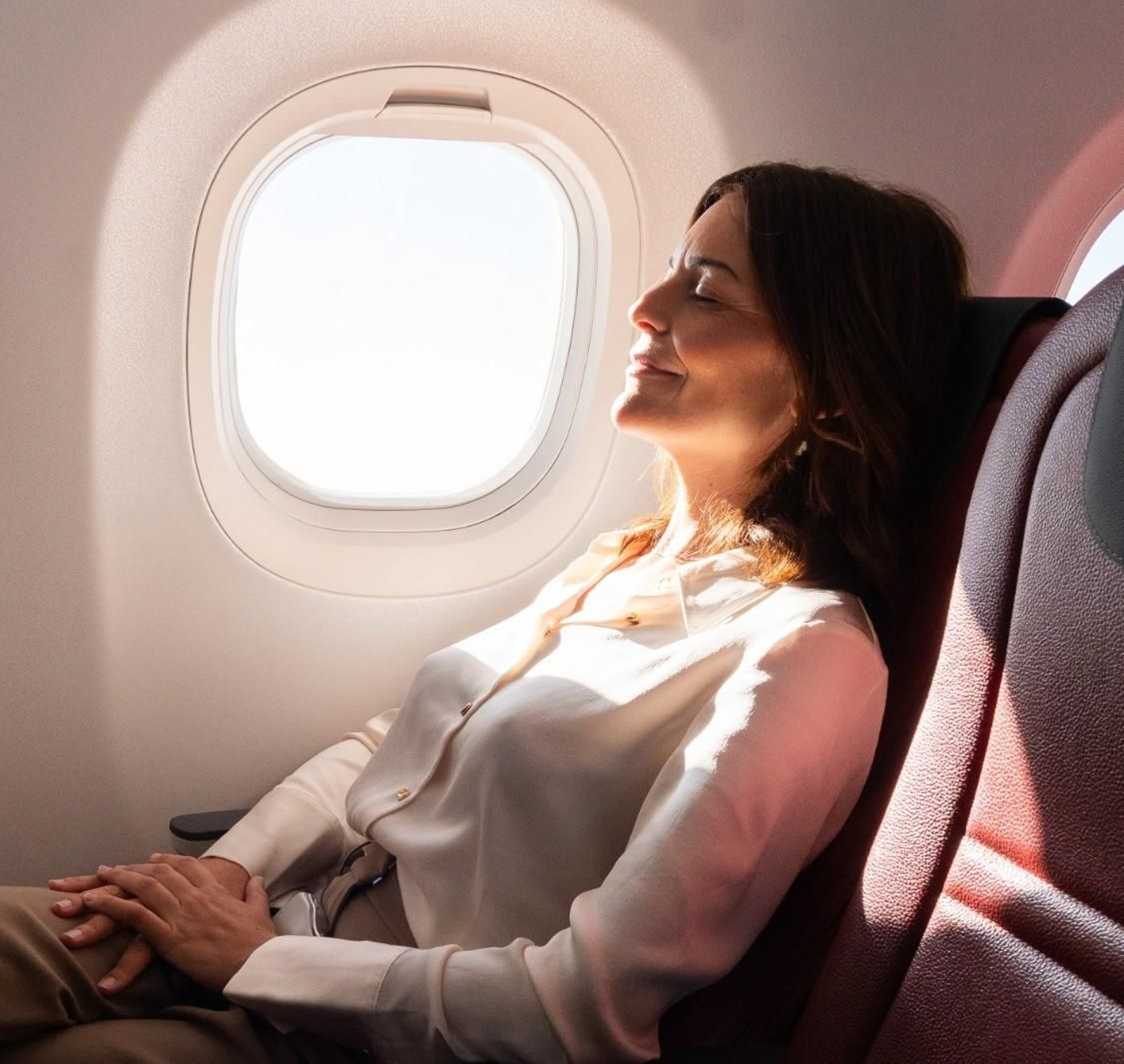 Pasajera en un avión de Binter