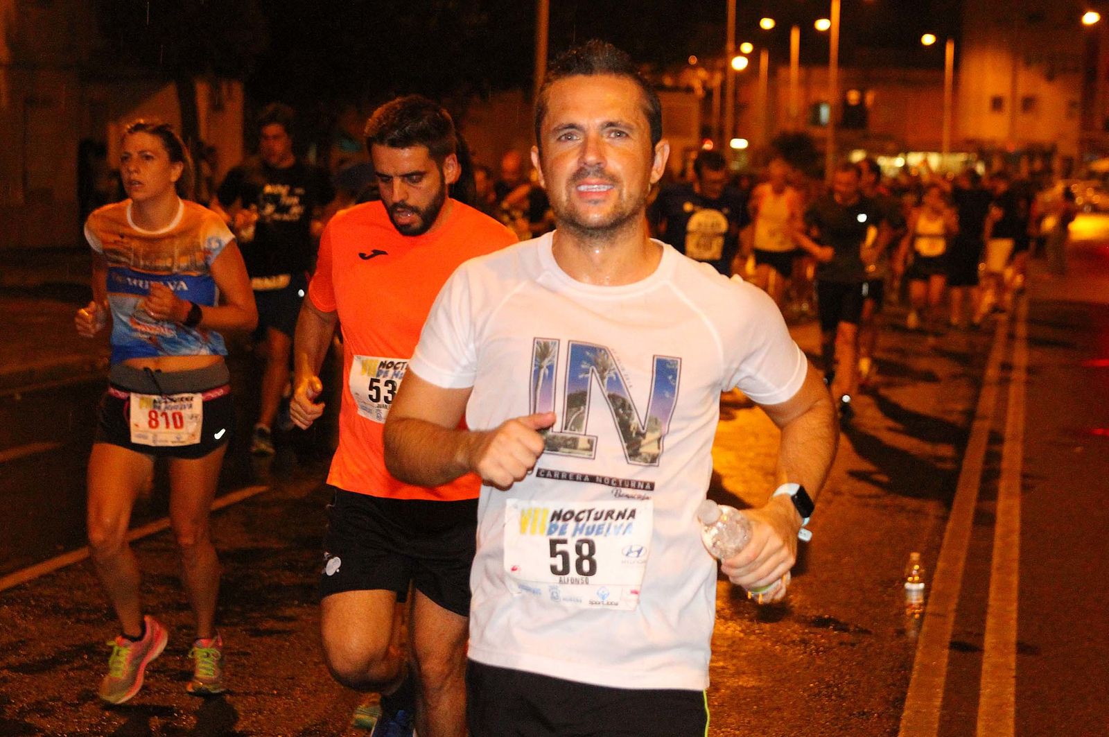 La VII Carrera Nocturna de Huelva en imágenes