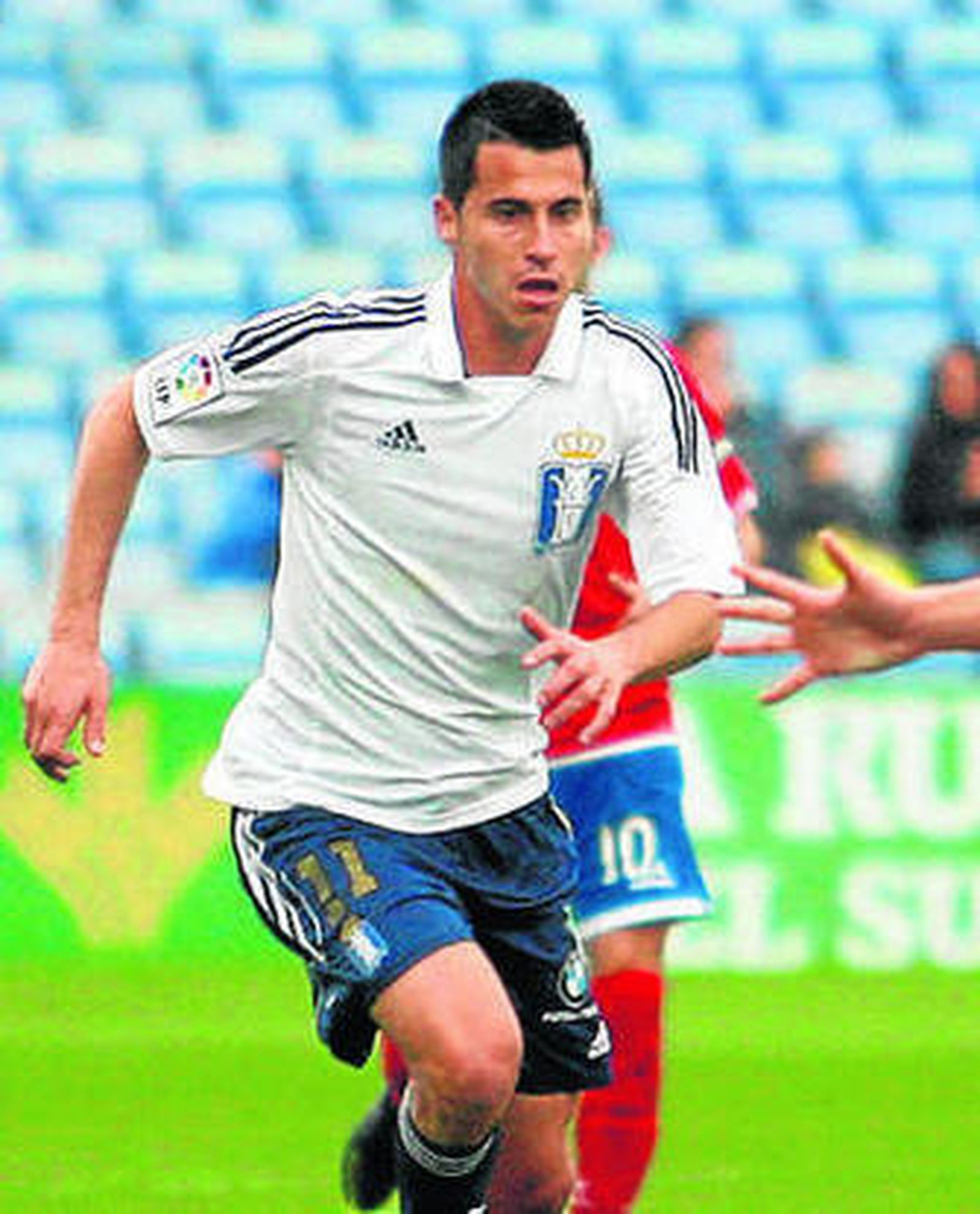 Jorge Larena, en un partido. A la derecha, José Fiscal.