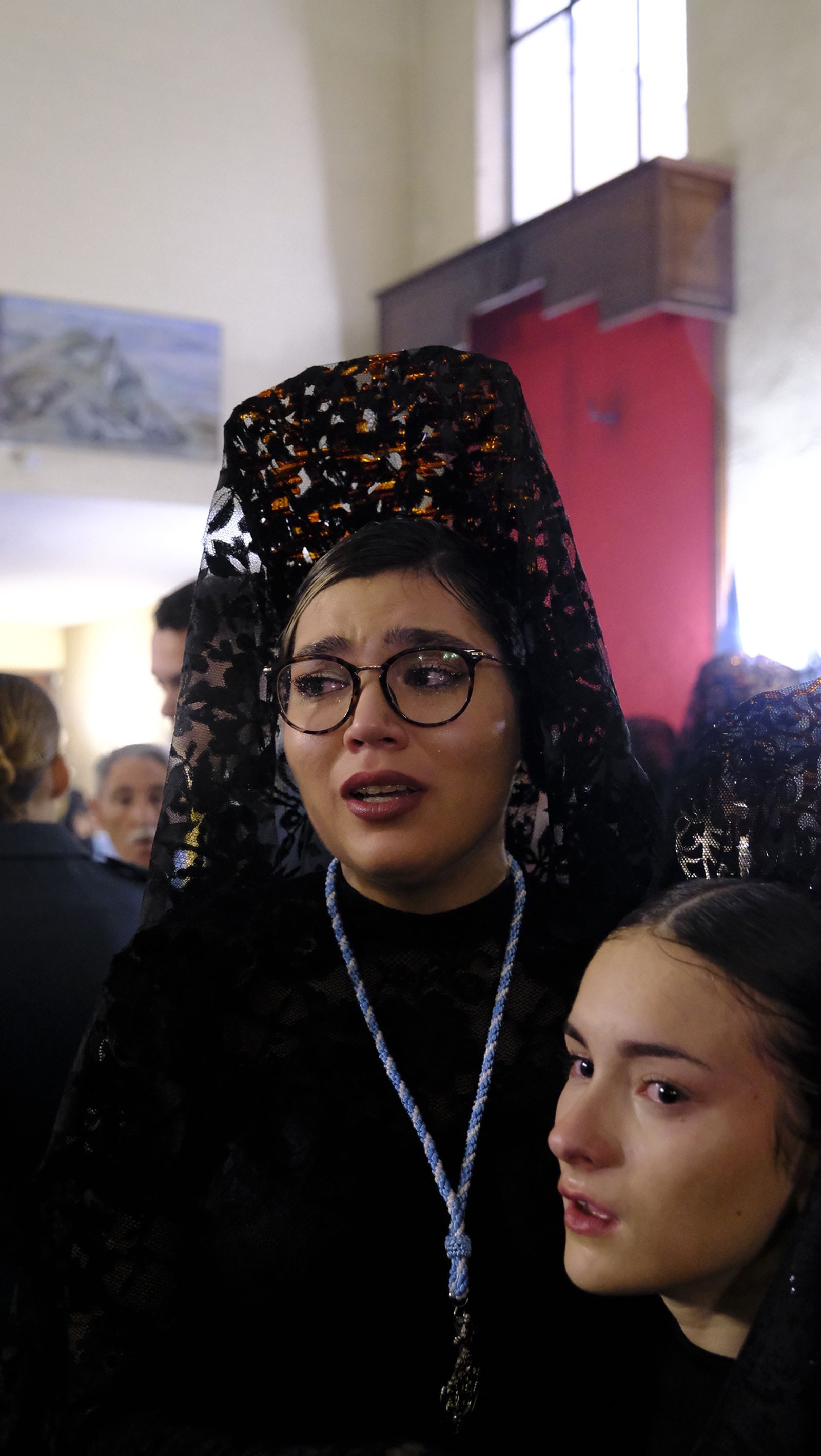 La Procesión de Los Ángeles de sobrepuso a la lluvia, en imágenes