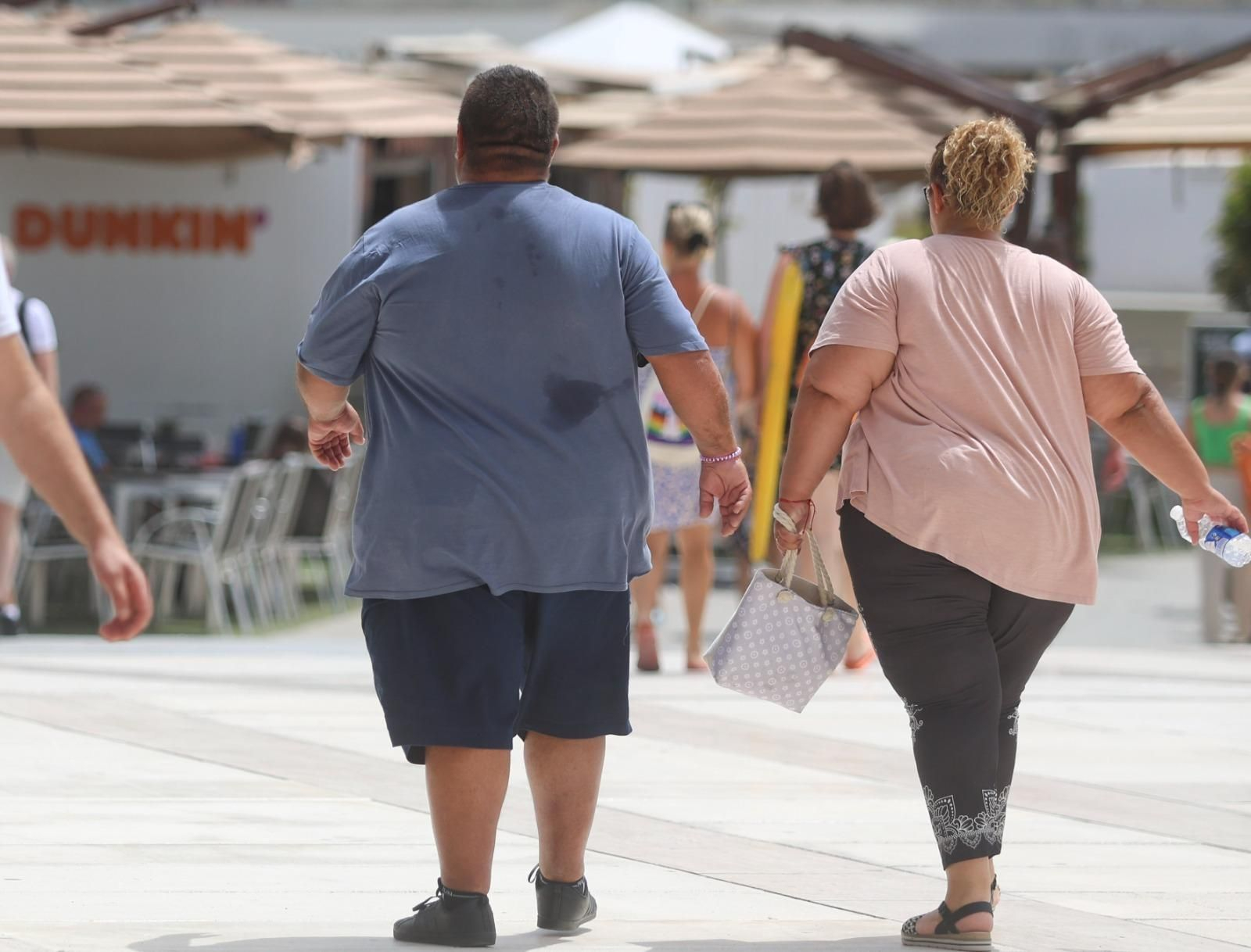 Dos personas obesas, en Málaga.