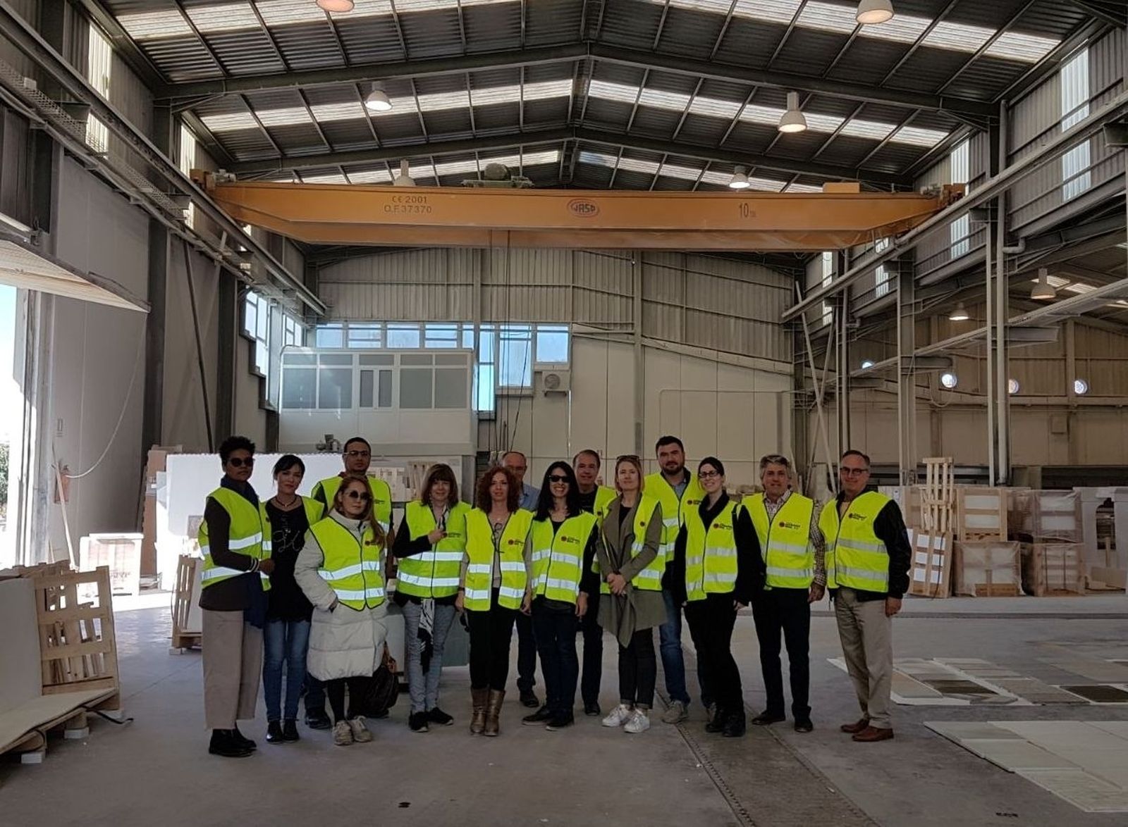 La delegación internacional y técnicos de Extenda y AEMA en las visitas.