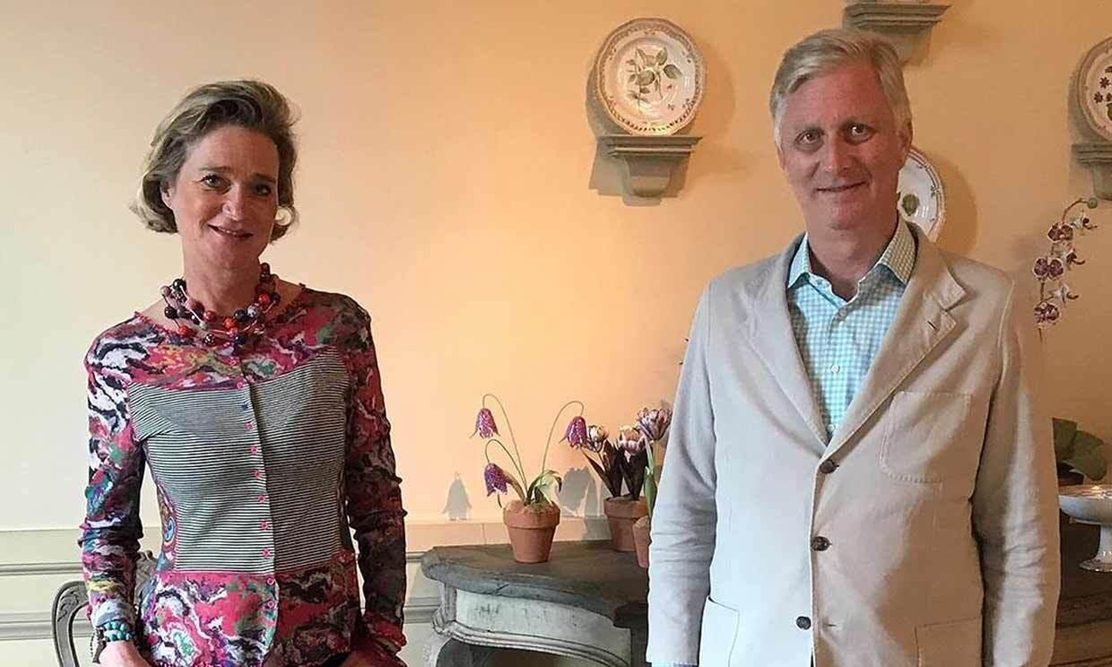 Felipe de Bélgica y su hermana Delphine, en la foto oficial que ha distribuido la casa real belga.