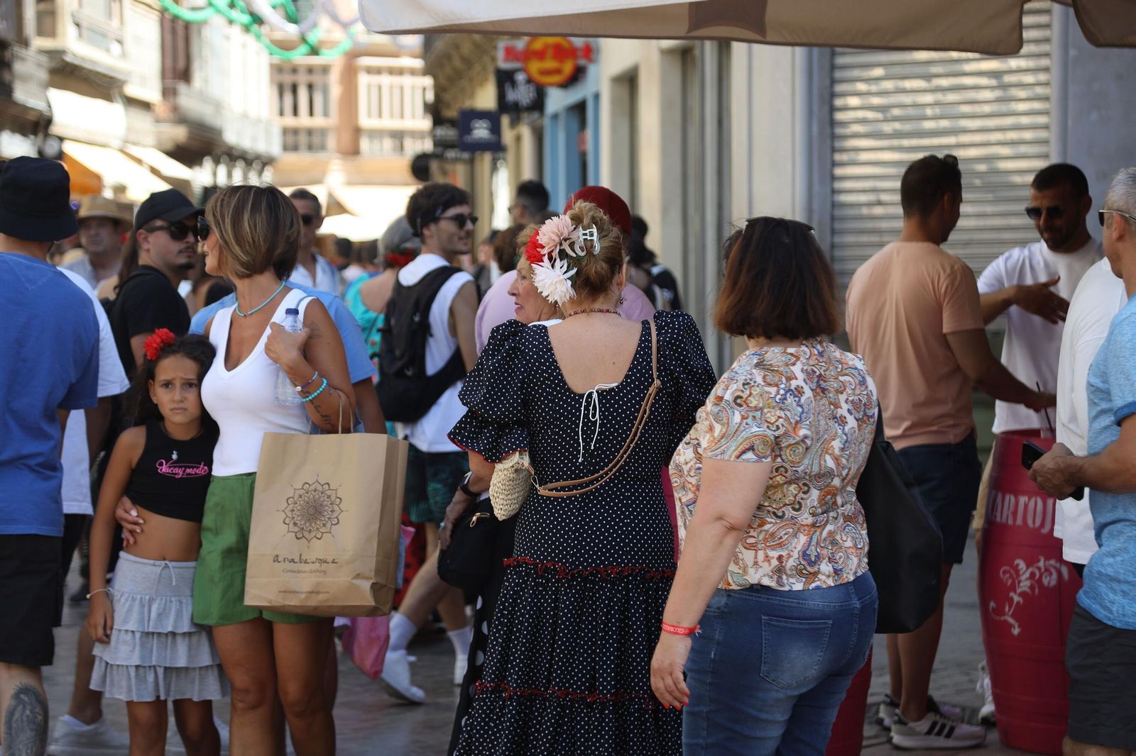 El miércoles de Feria en el Centro de Málaga, en imágenes