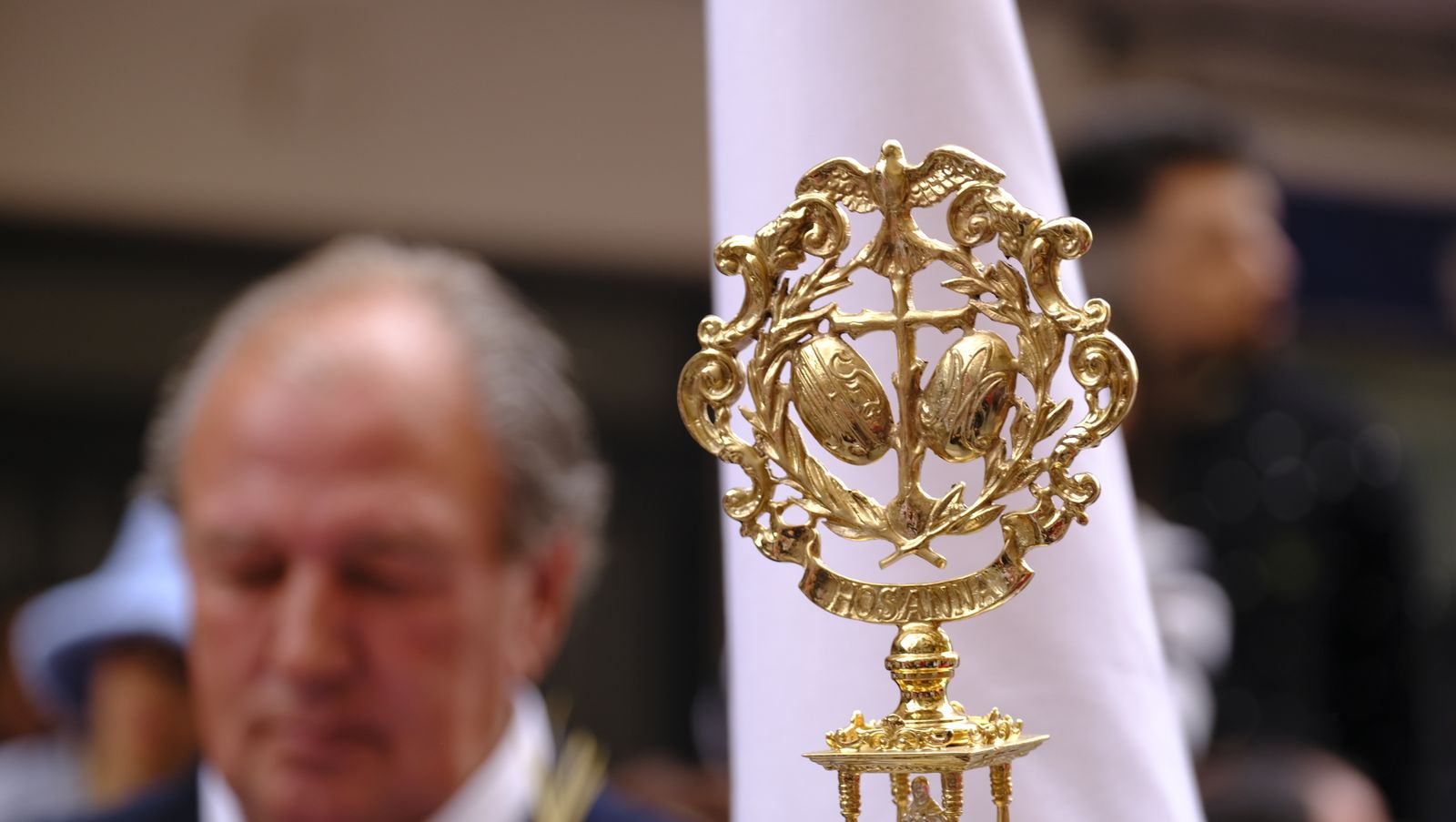 La Borriquita procesiona por las calles de Almería, en imágenes