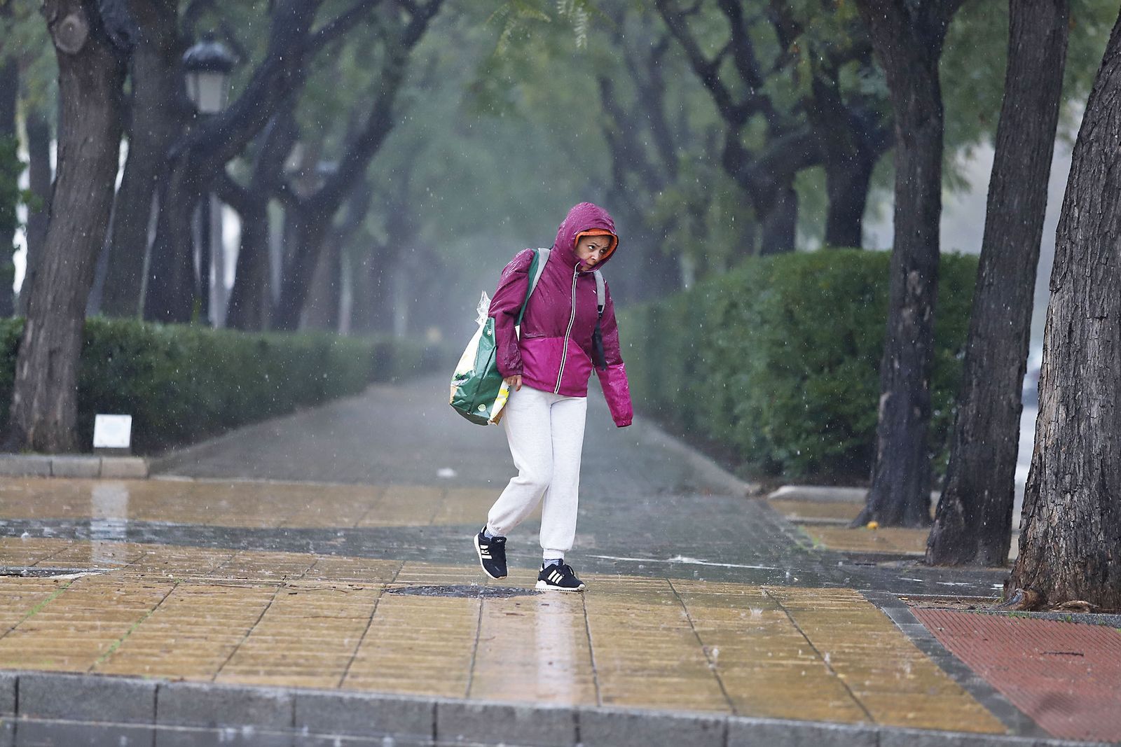 imágenes de la lluviosa mañana en Huelva