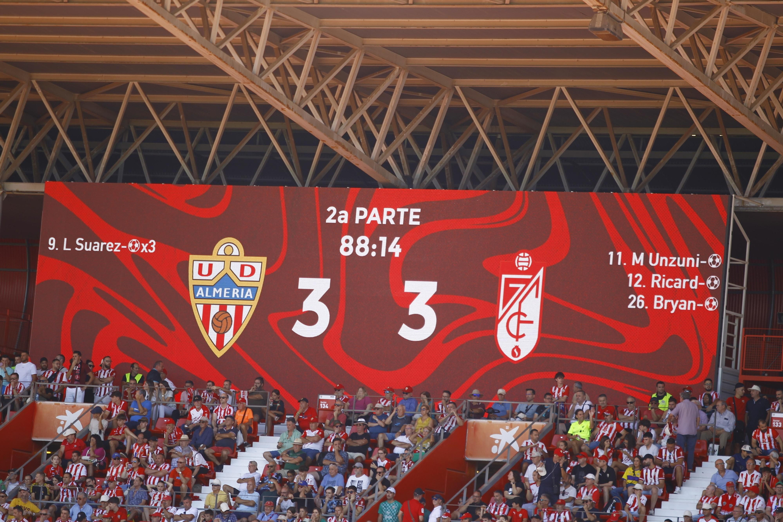 Imágenes del empate a 3 de la U.D. Almería y el Granada C.F.