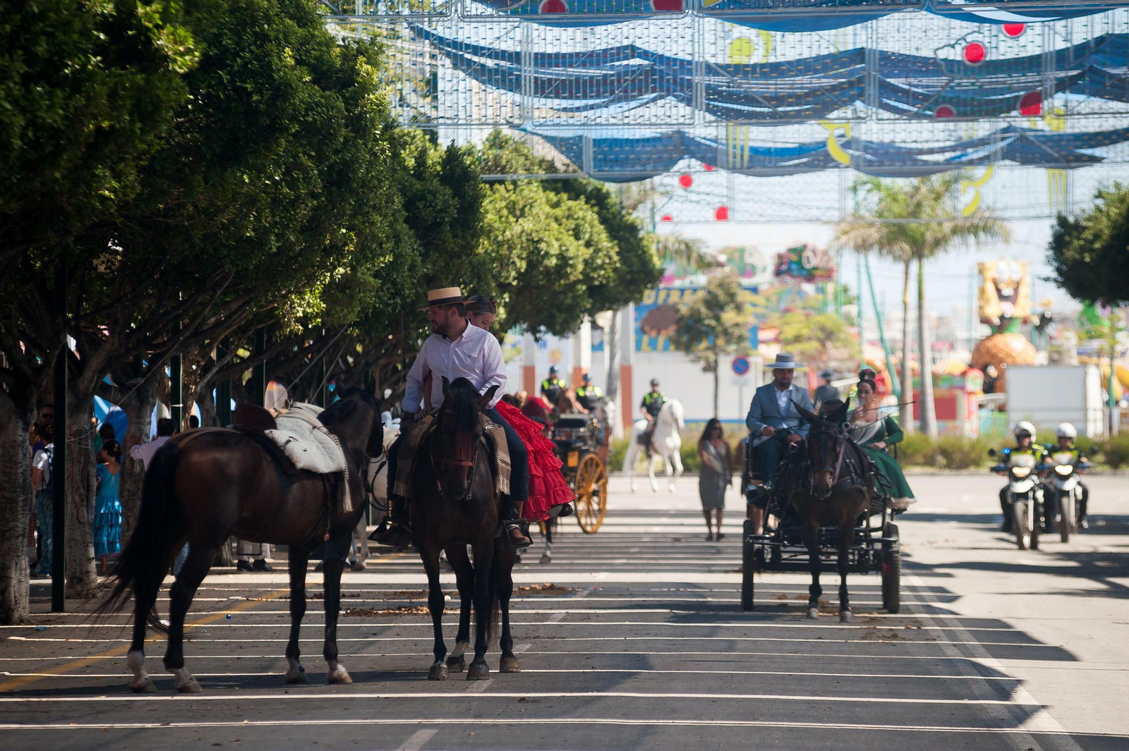 Segundo día de Feria de Málaga en el Centro y en el Real, en fotos