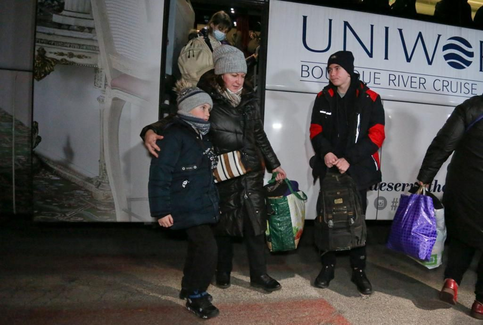 La llegada a Málaga del autobús con 47 ucranianos, en fotos
