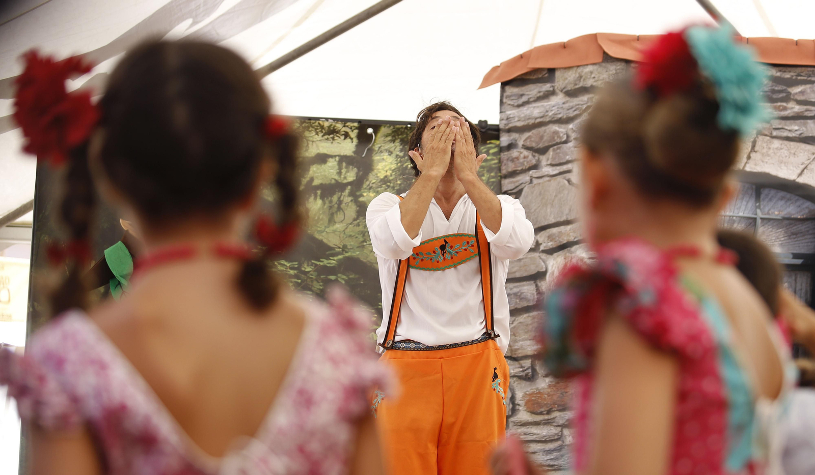 Fotos del cuarto día de Feria de Málaga en el Centro y la noche en el Real