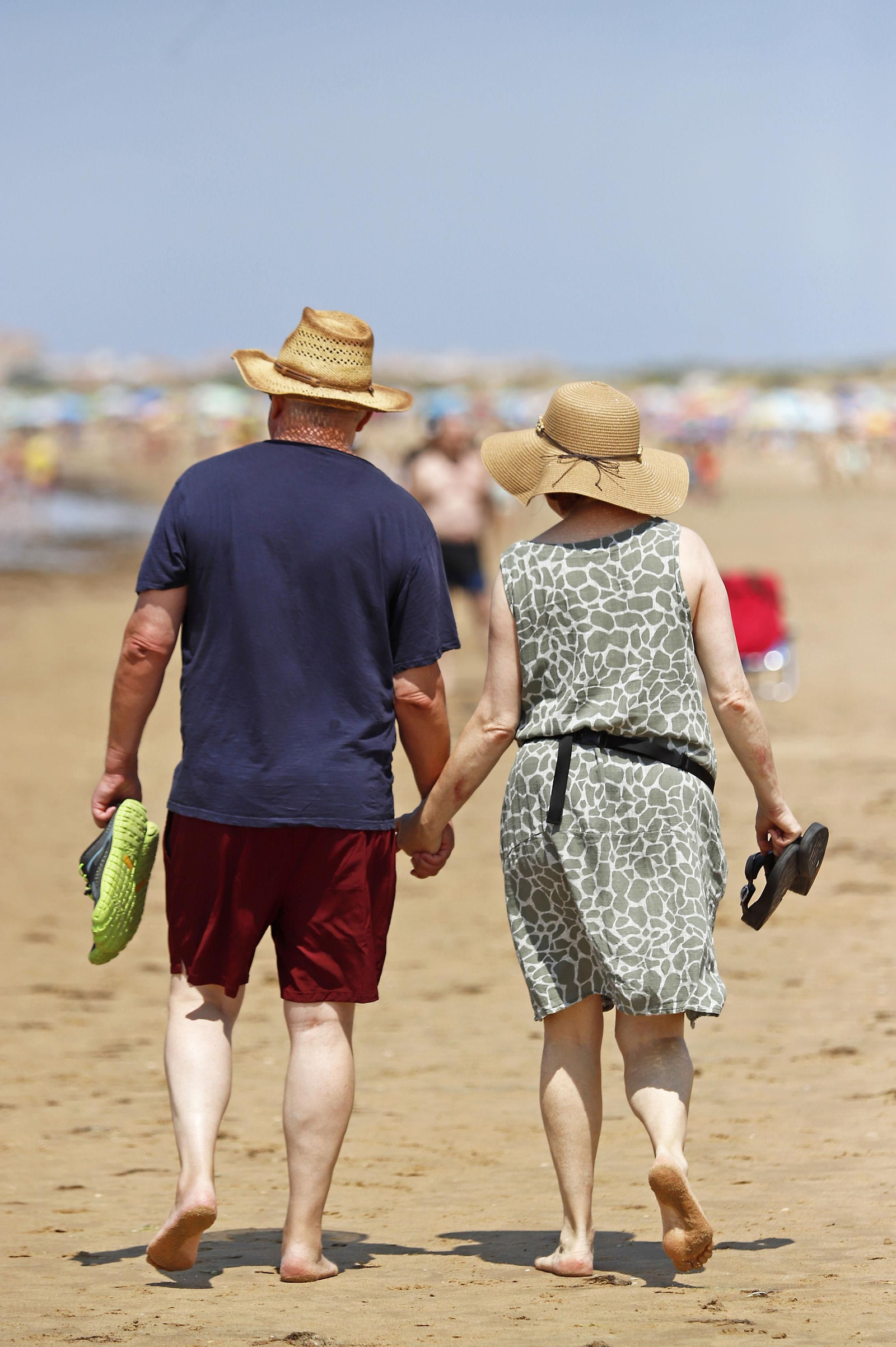 Las imágenes de la jornada de domingo en las playas de Huelva