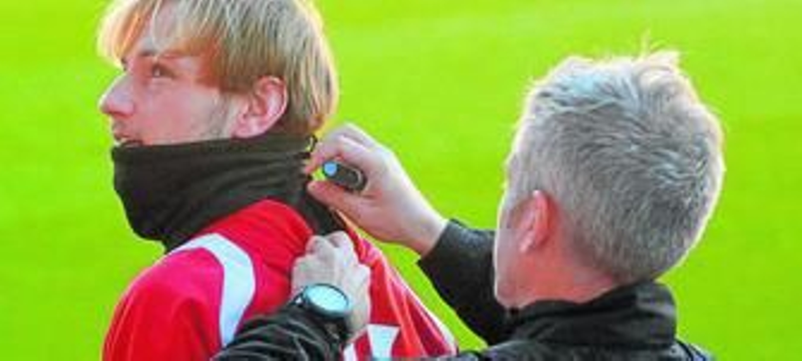 Ivan Rakitic, junto al preparador físico.