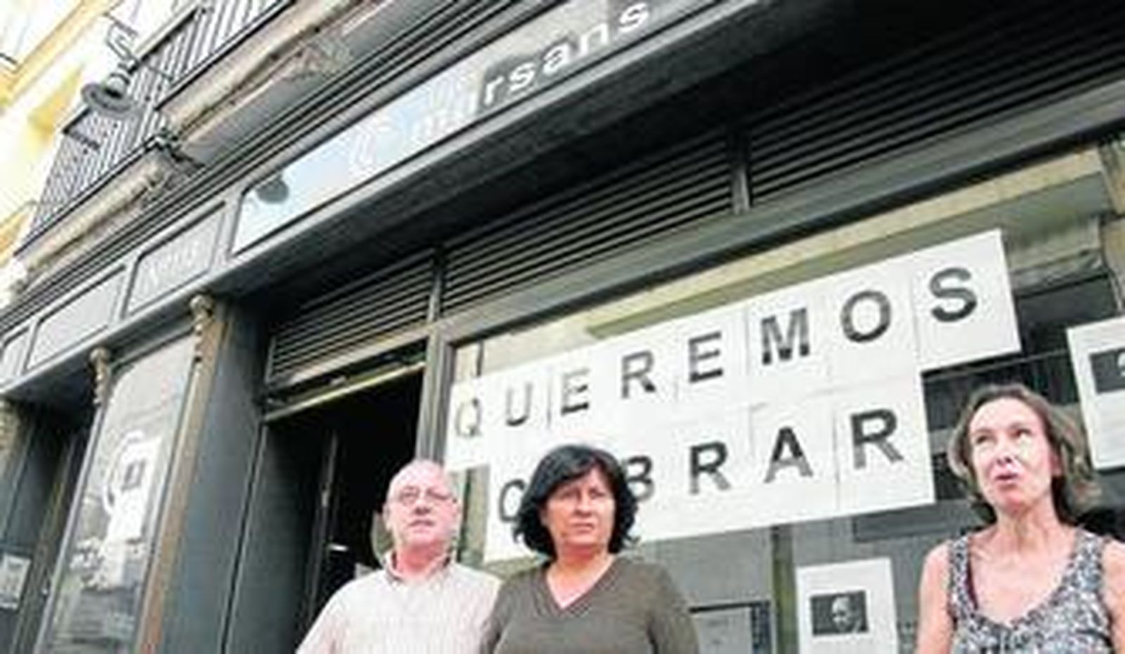 Tres de los empleados de la oficina de Viajes Marsans de la calle Larga.