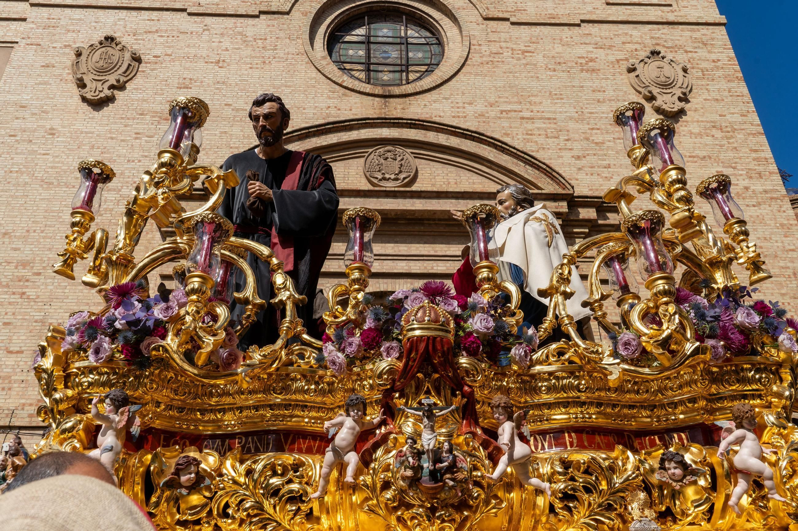 Domingo de Ramos: Imágenes de la procesión de La Sagrada Cena y Maria Santísima del Rosario