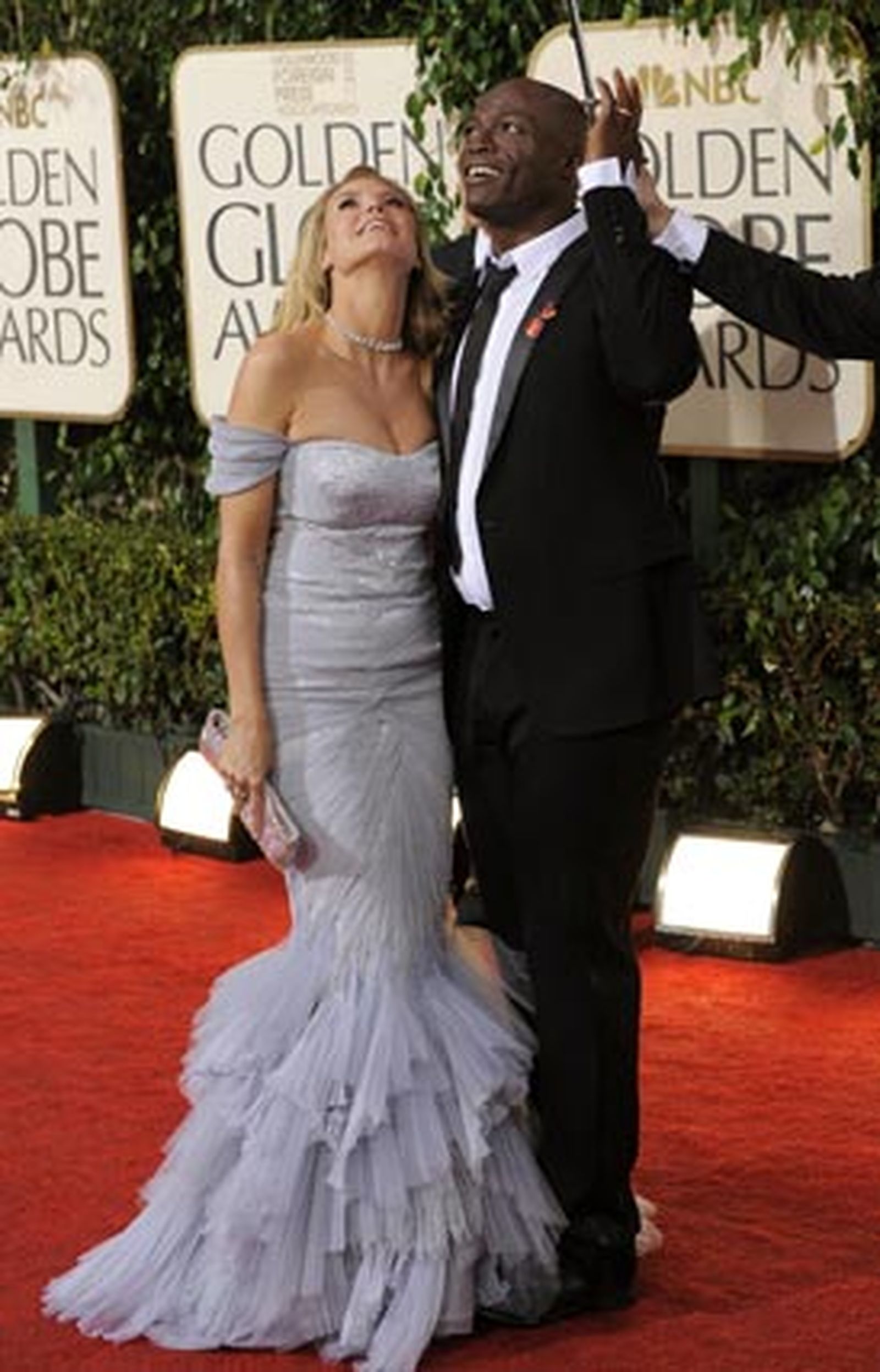 El cantante Seal, junto a la modelo Heidi Klum. / AFP