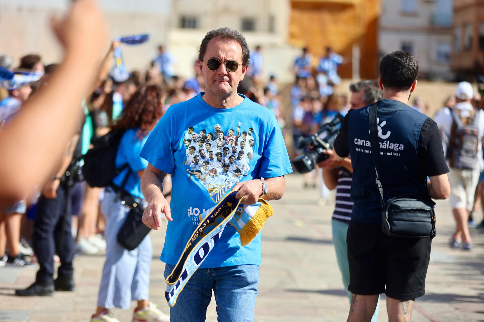 El malaguismo sale a la calle en avalancha: Las fotos de la celebración del ascenso