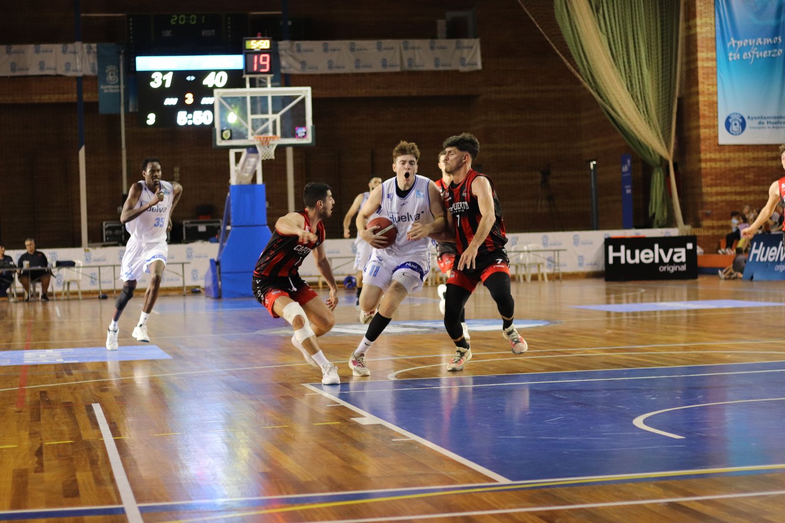 Imágenes de la primera jornada de la fase final a LEB Plata: CB Puerto Sagunto vs Ciudad de Huelva