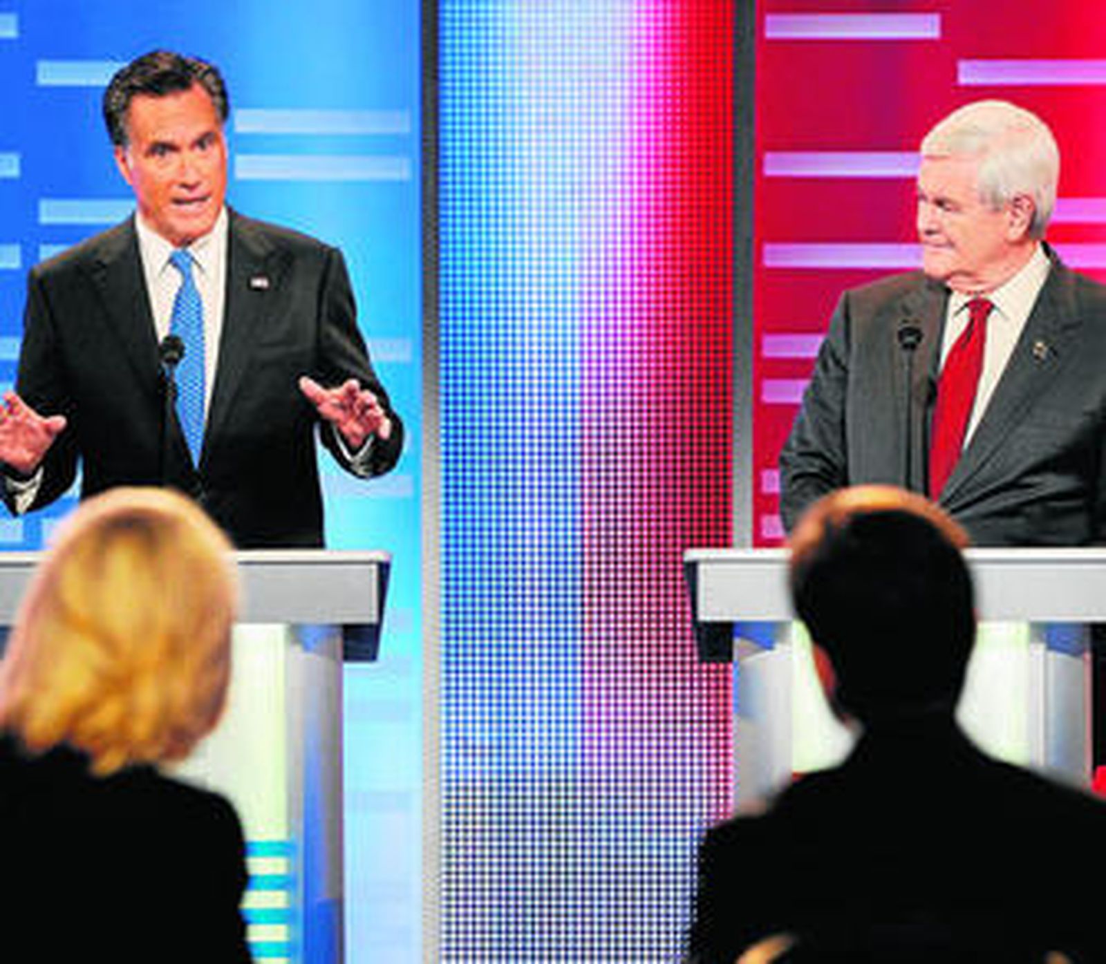 Mitt Romney, a la izquierda, y Newt Gingrich, en un momento del debate.