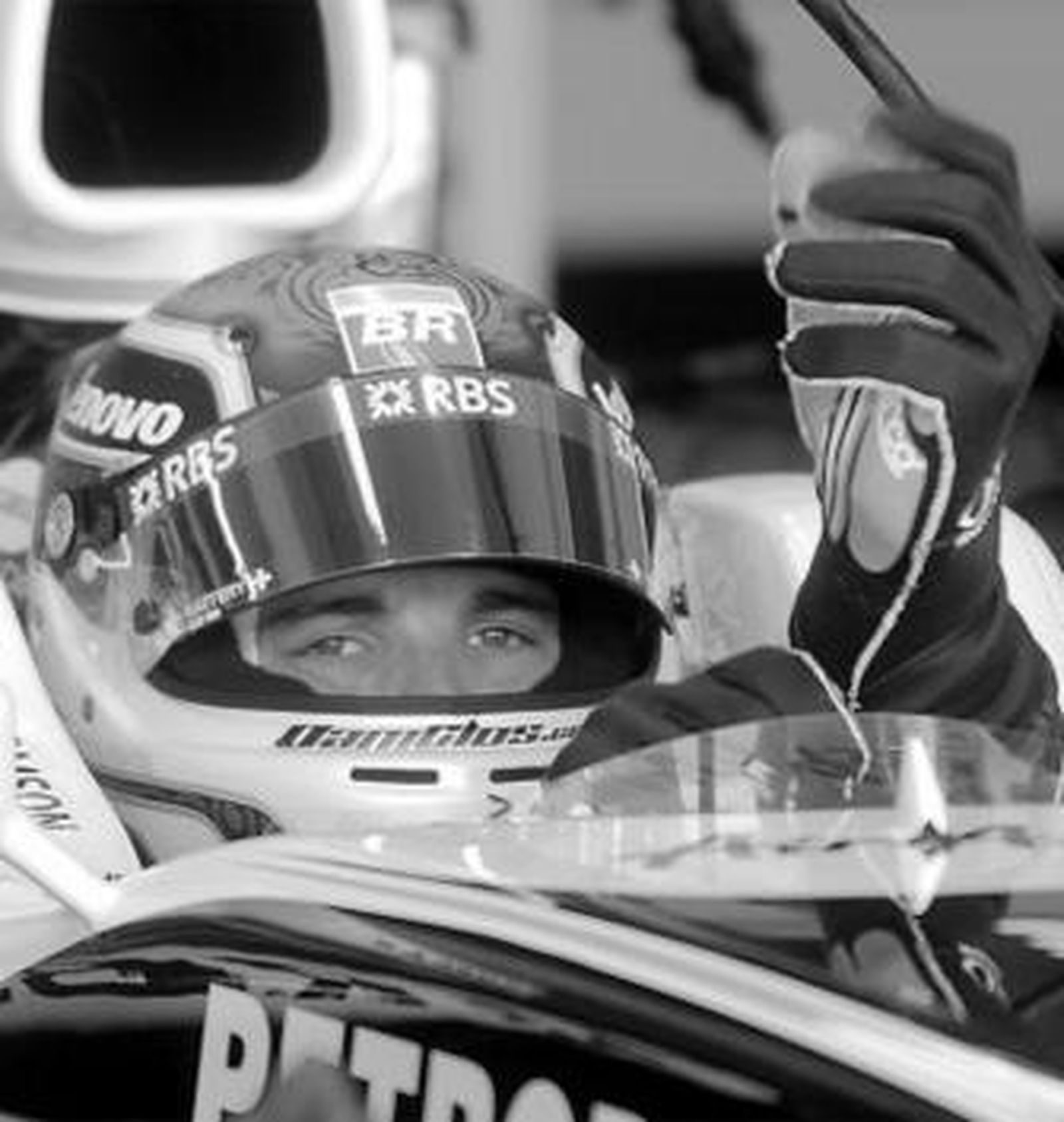 Dani Clos vivió ayer uno de los días más especiales de su vida; a la izquierda, ajustándose los guantes; a la derecha, en el pit-lane jerezano.