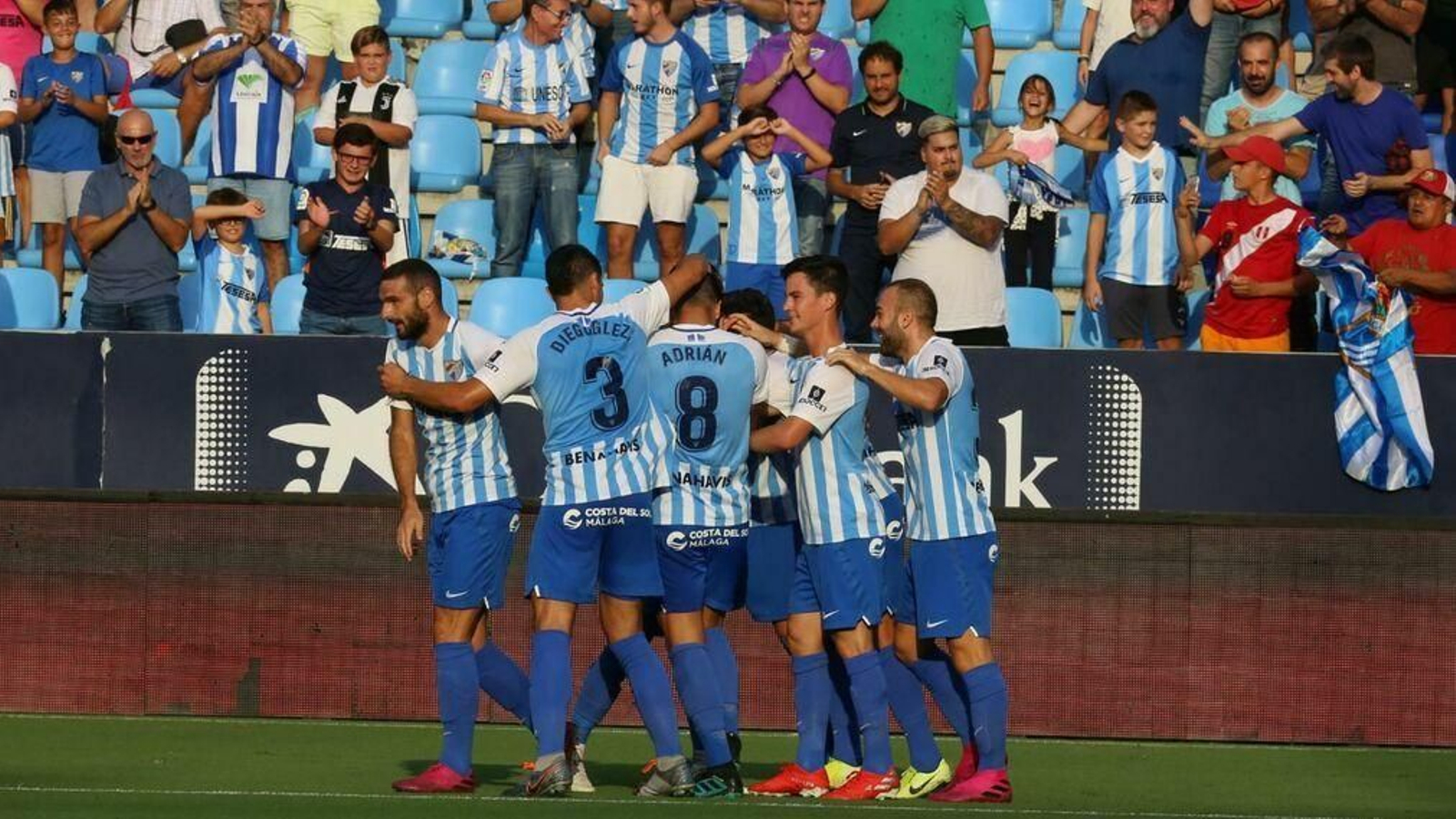 Jugadores del Málaga celebrando un gol.