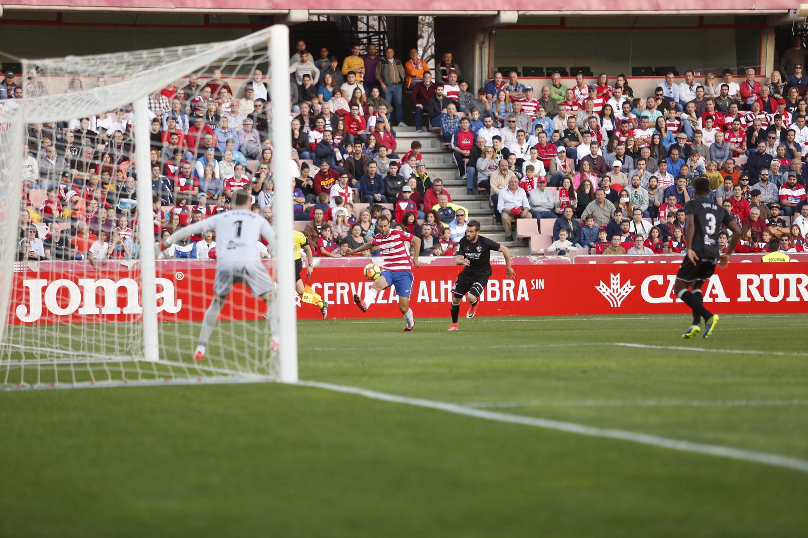 El Granada CF-Huesca, en imágenes