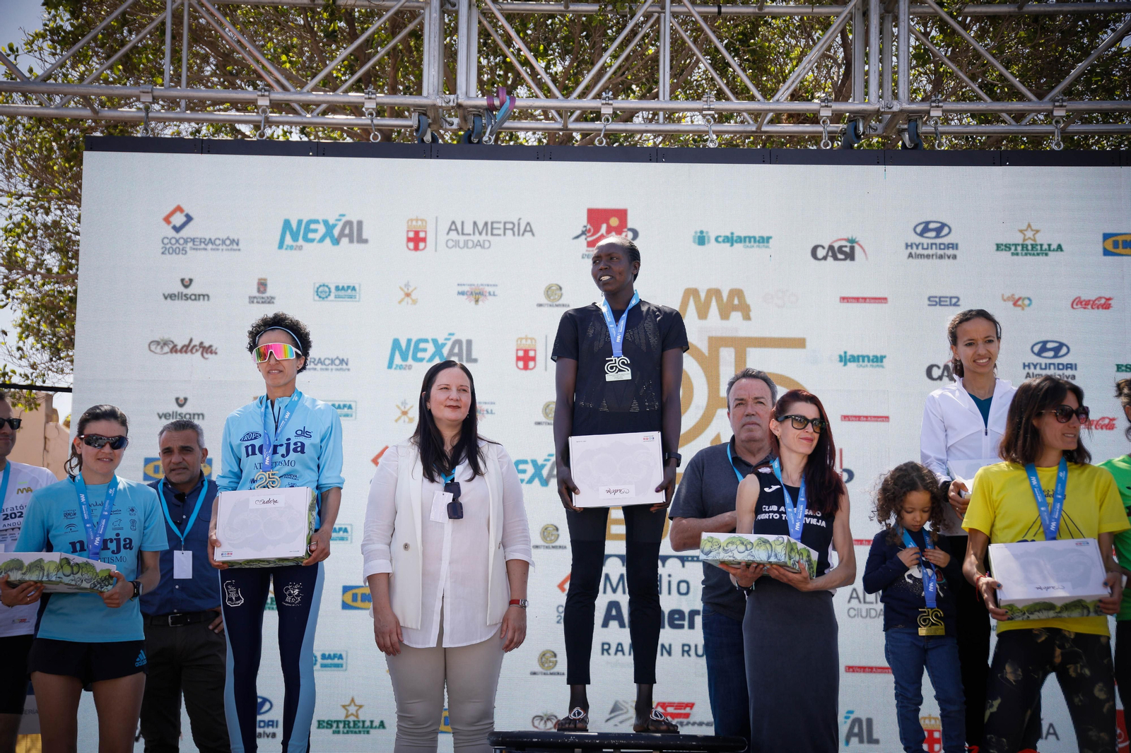 Imágenes de los premiados en la Media maratón de la Cuidad de Almería