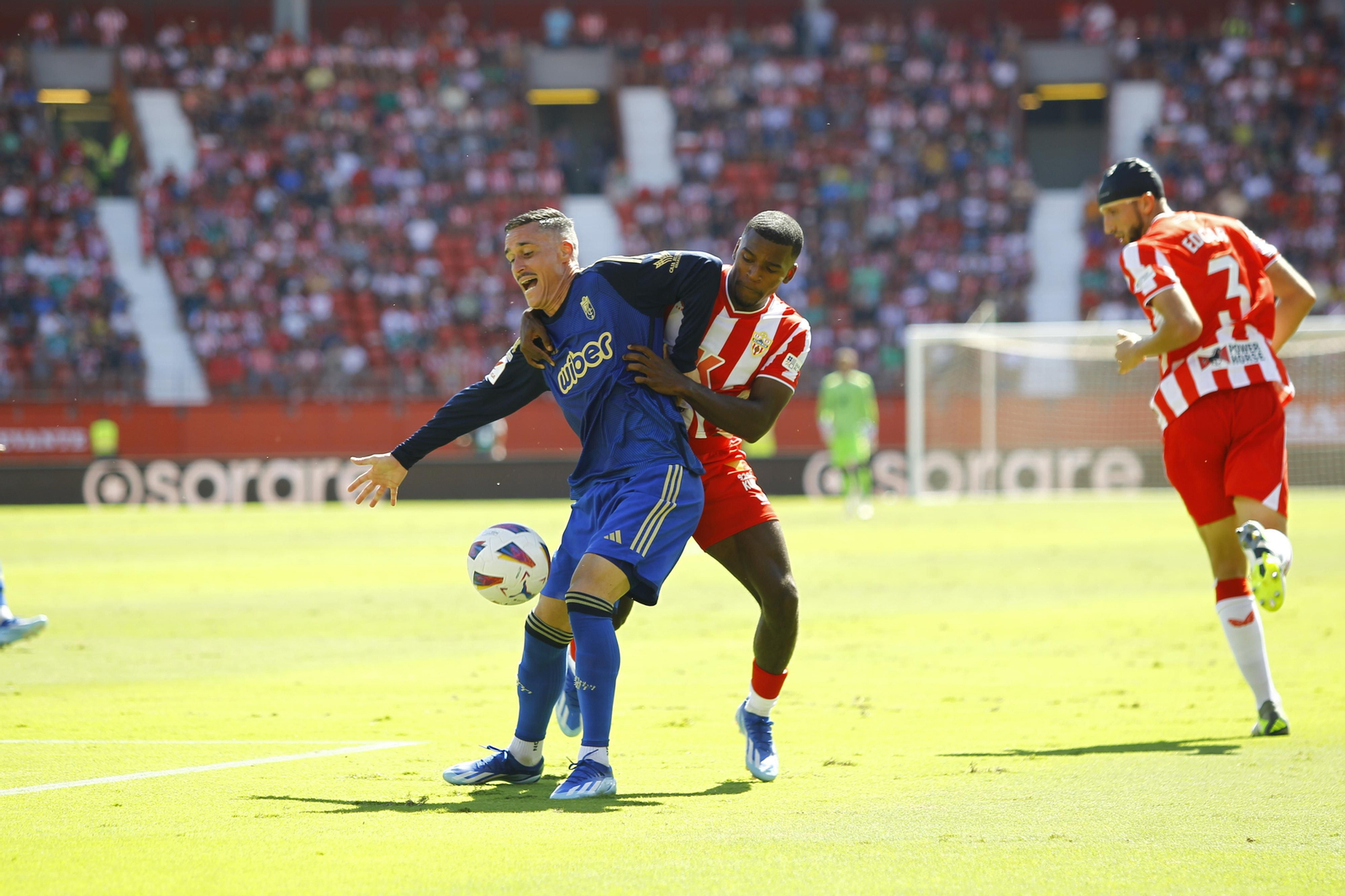 Imágenes del empate a 3 de la U.D. Almería y el Granada C.F.