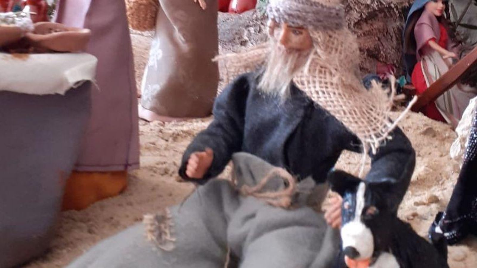 Un mendigo con su perro