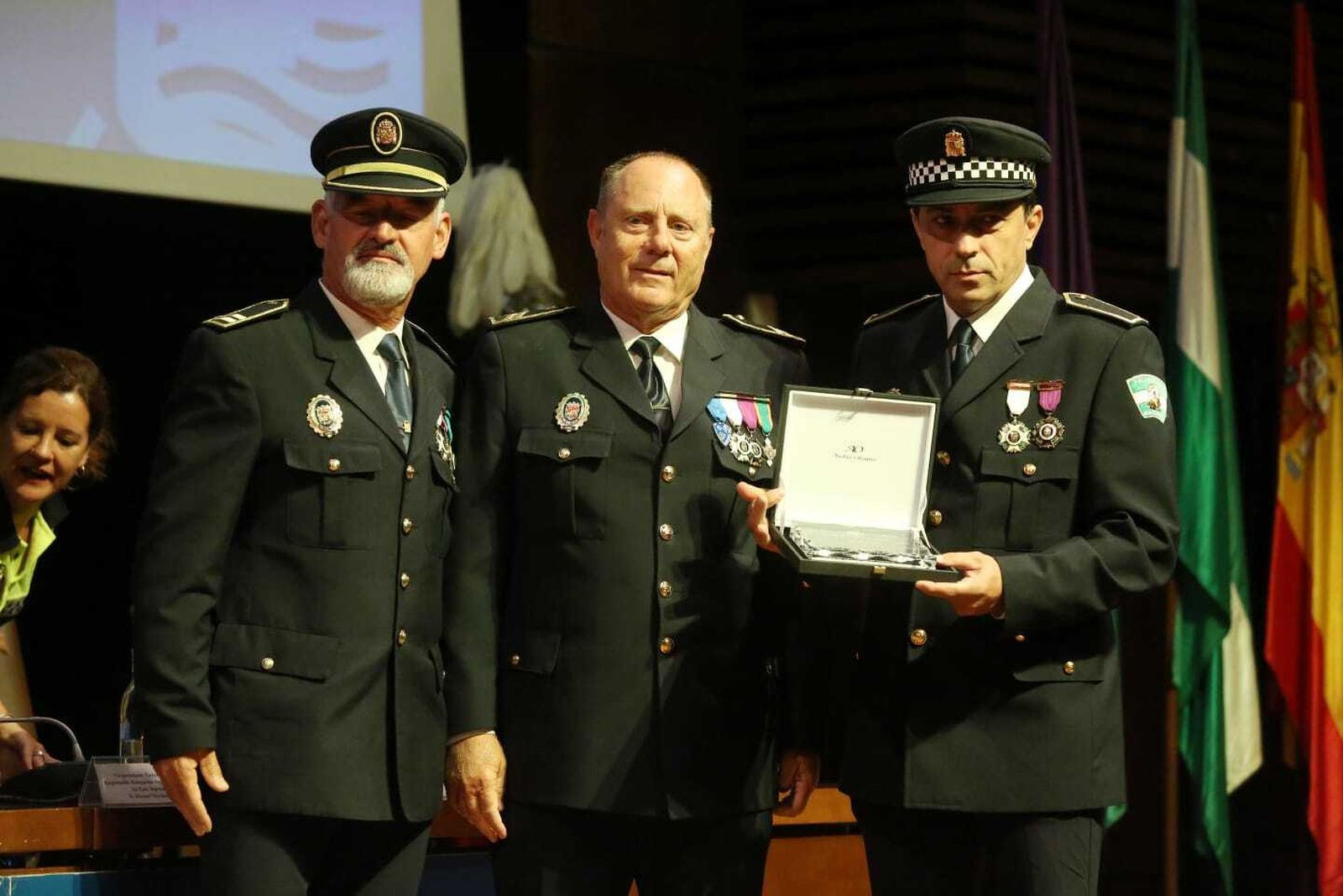 Las imágenes del acto de distinción de agentes de la Policía Local de Málaga en el día de su patrón