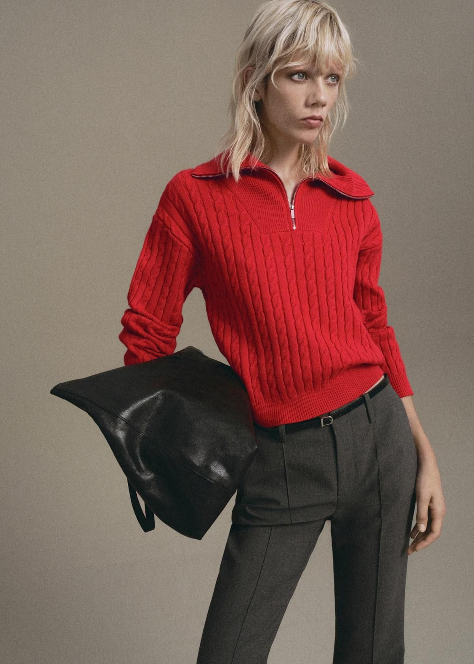 Jersey con cremallera de Mango.