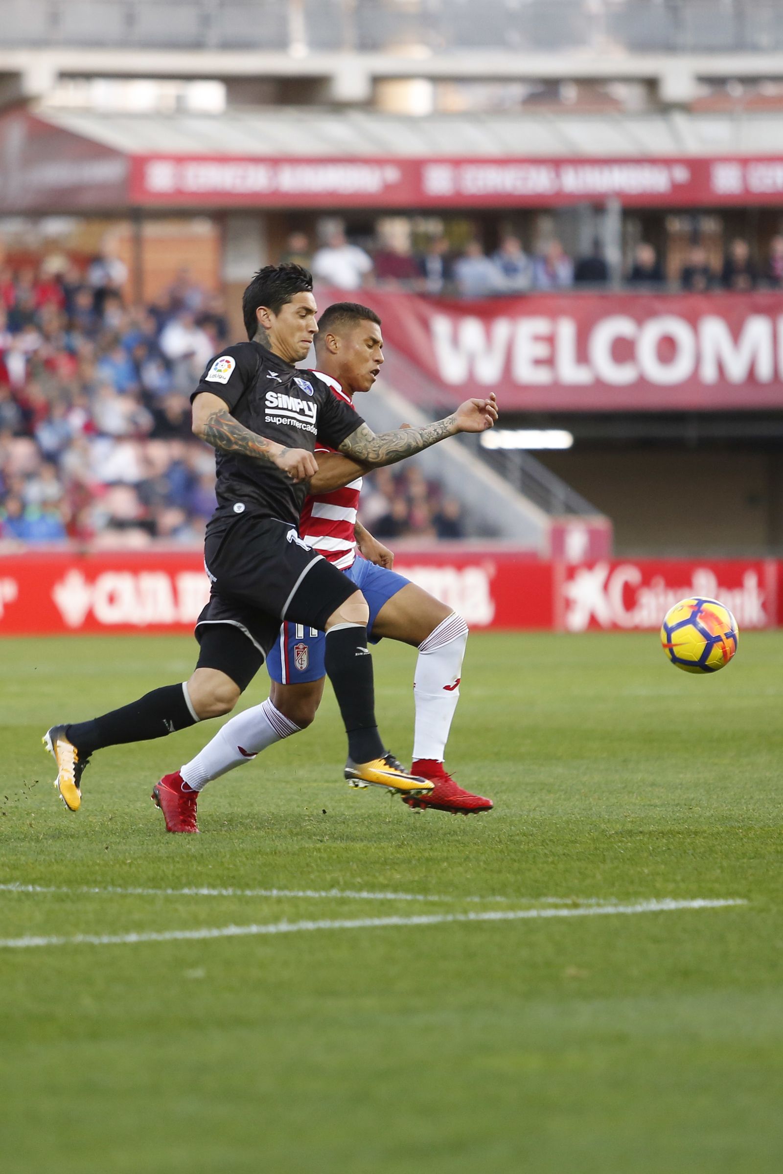 El Granada CF-Huesca, en imágenes