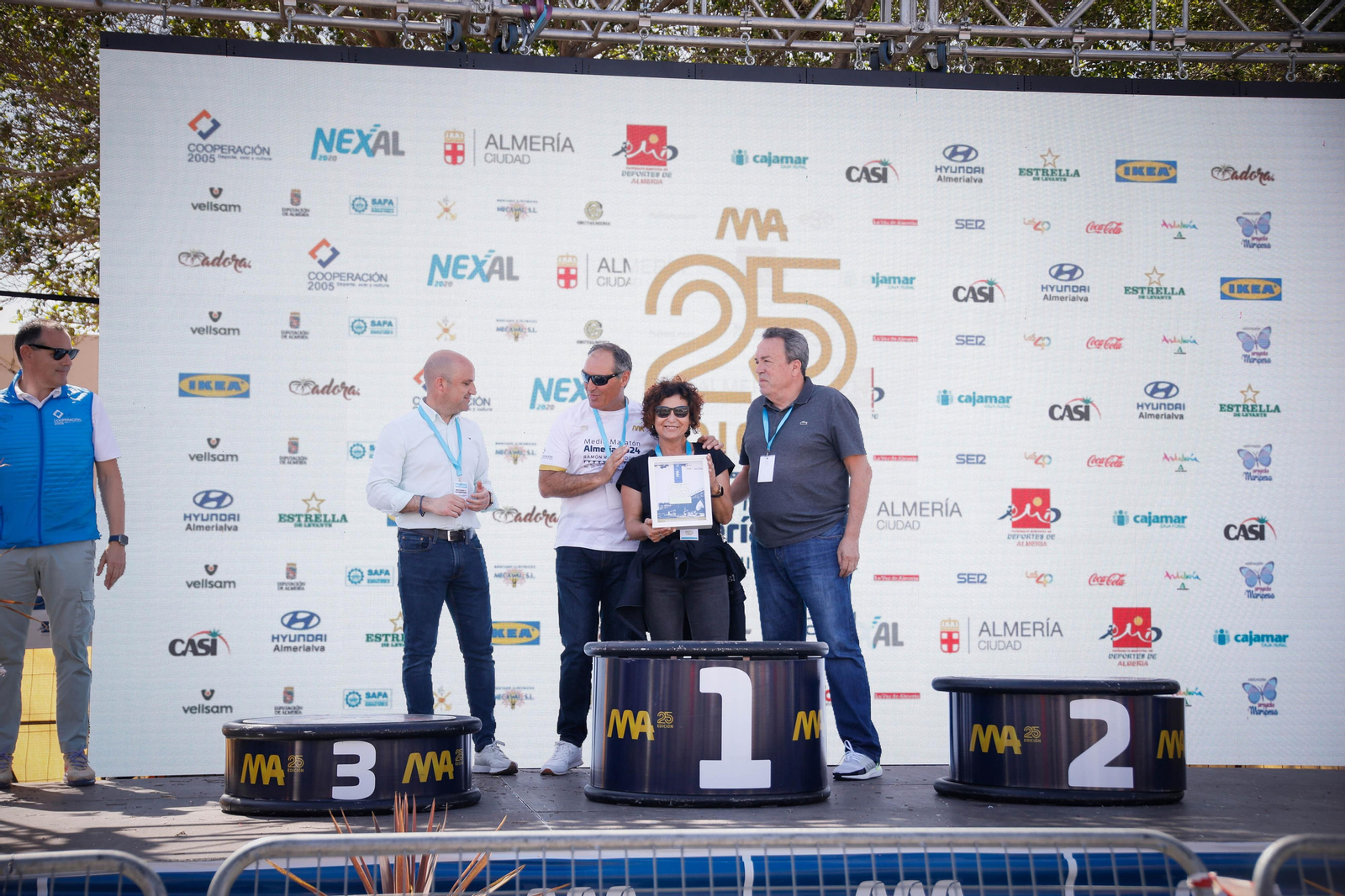 Imágenes de los premiados en la Media maratón de la Cuidad de Almería